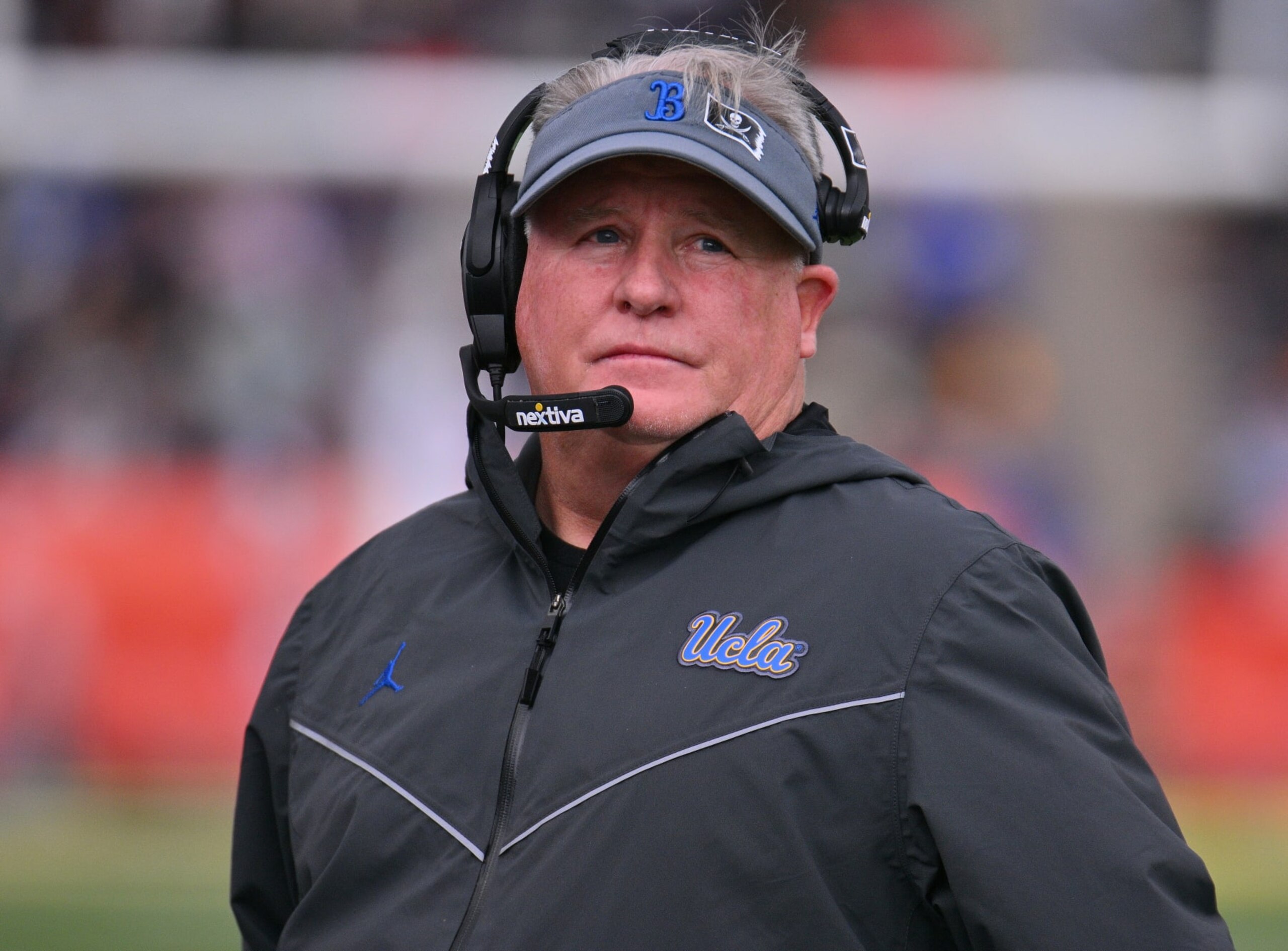 EL PASO, TEXAS - DECEMBER 30: Head coach Chip Kelly of the UCLA Bruins looks on during the first half of the Tony the Tiger Sun Bowl game against the Pittsburgh Panthers at Sun Bowl Stadium on December 30, 2022 in El Paso, Texas. (Photo by Sam Wasson/Getty Images) EL PASO, TEXAS - DECEMBER 30: Head coach Chip Kelly of the UCLA Bruins looks on during the first half of the Tony the Tiger Sun Bowl game against the Pittsburgh Panthers at Sun Bowl Stadium on December 30, 2022 in El Paso, Texas. (Photo by Sam Wasson/Getty Images)