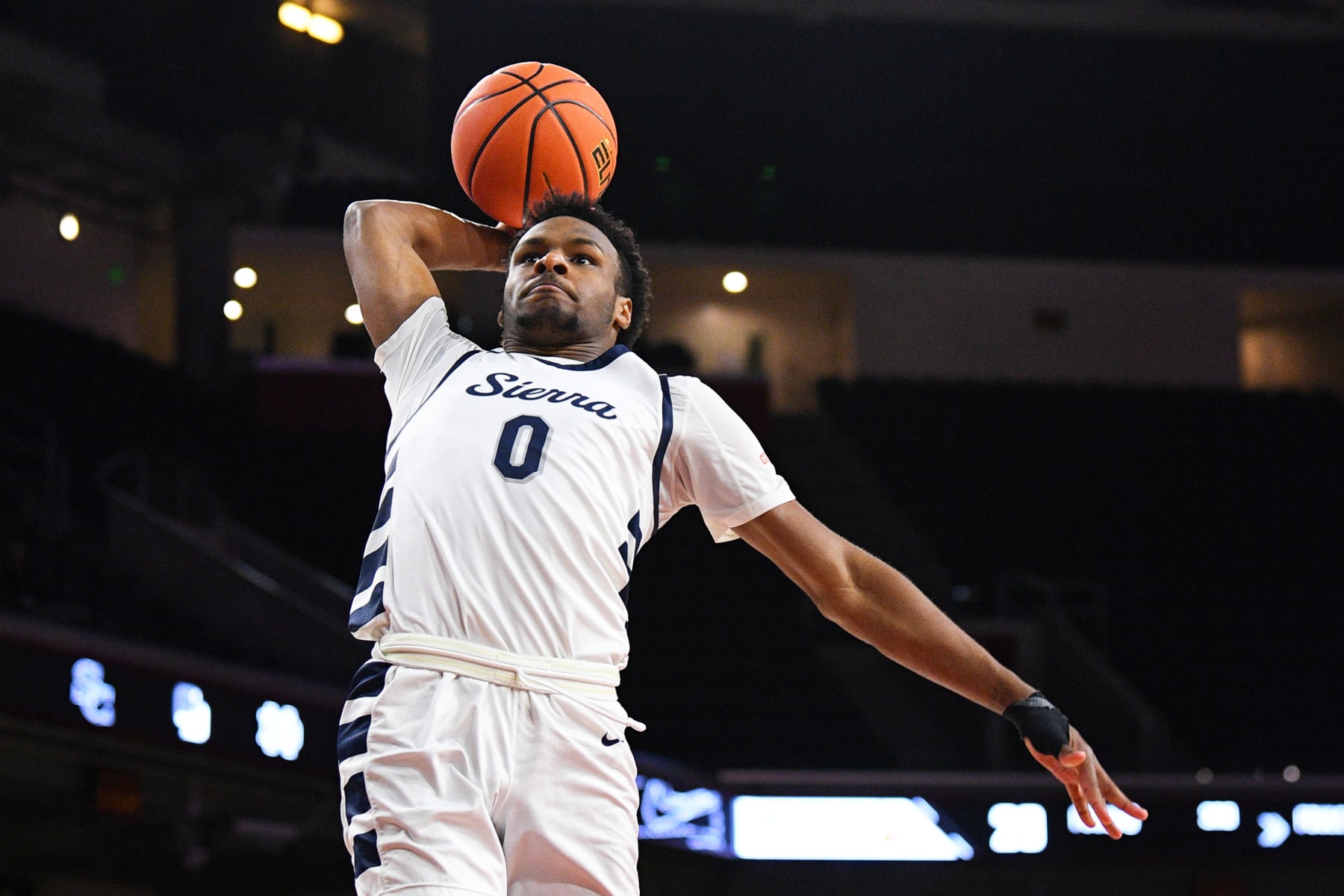 LOS ANGELES, CA - JANUARY 07: Sierra Canyon guard Bronny James goes up for a dunk during a high school basketball game between Sierra Canyon and Wheeler in The Chosen-1's Invitational at Galen Center on January 7, 2023 in Los Angeles, California. (Photo by Brian Rothmuller/Icon Sportswire via Getty Images).