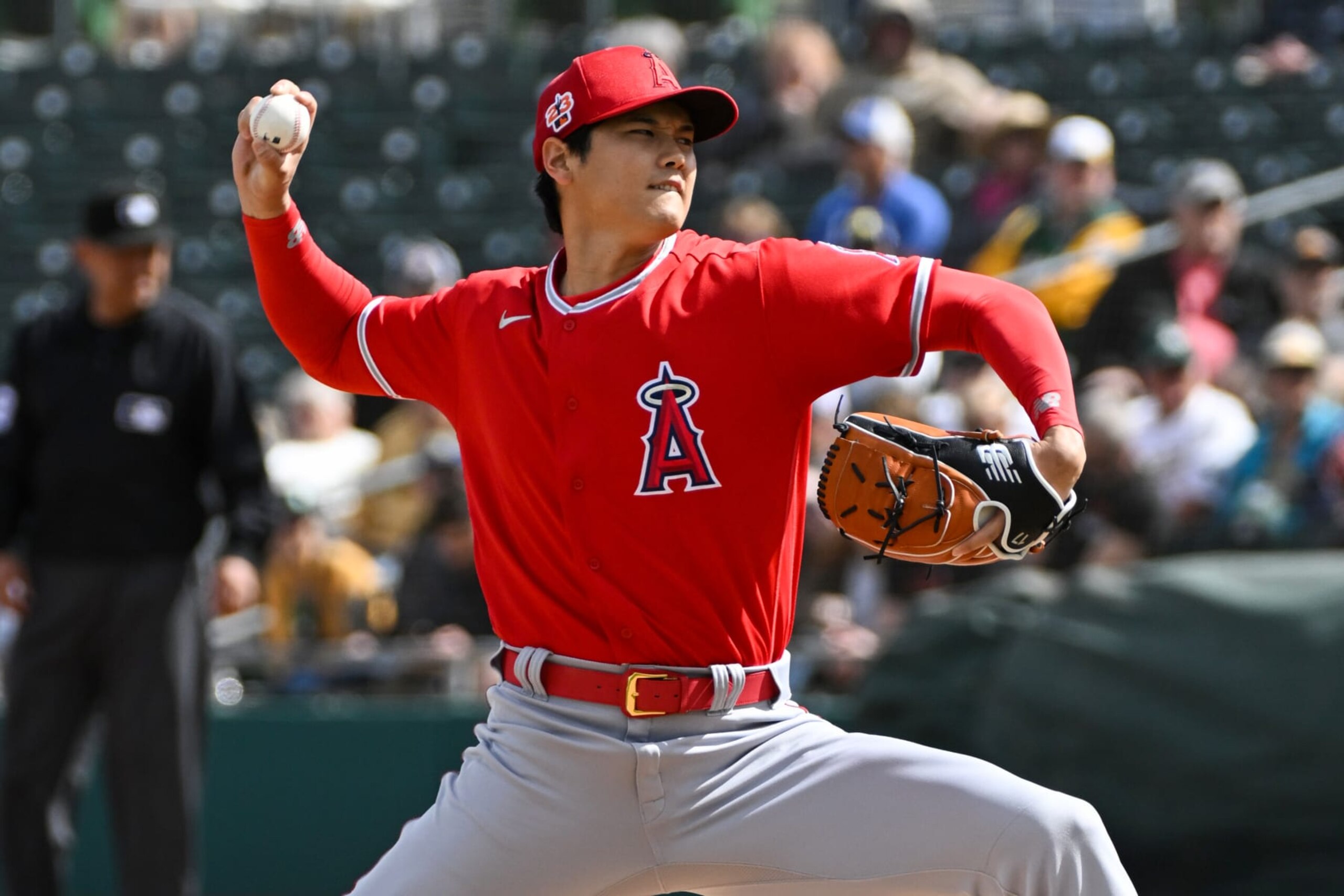 MESA, ARIZONA - FEBRUARY 28, 2023: Shohei Ohtani #17 of the Los Angeles Angels throws a pitch during the first inning of a spring training game against the Oakland Athletics at Hohokam Stadium on February 28, 2023 in Mesa, Arizona. (Photo by David Durochik/Diamond Images via Getty Images)