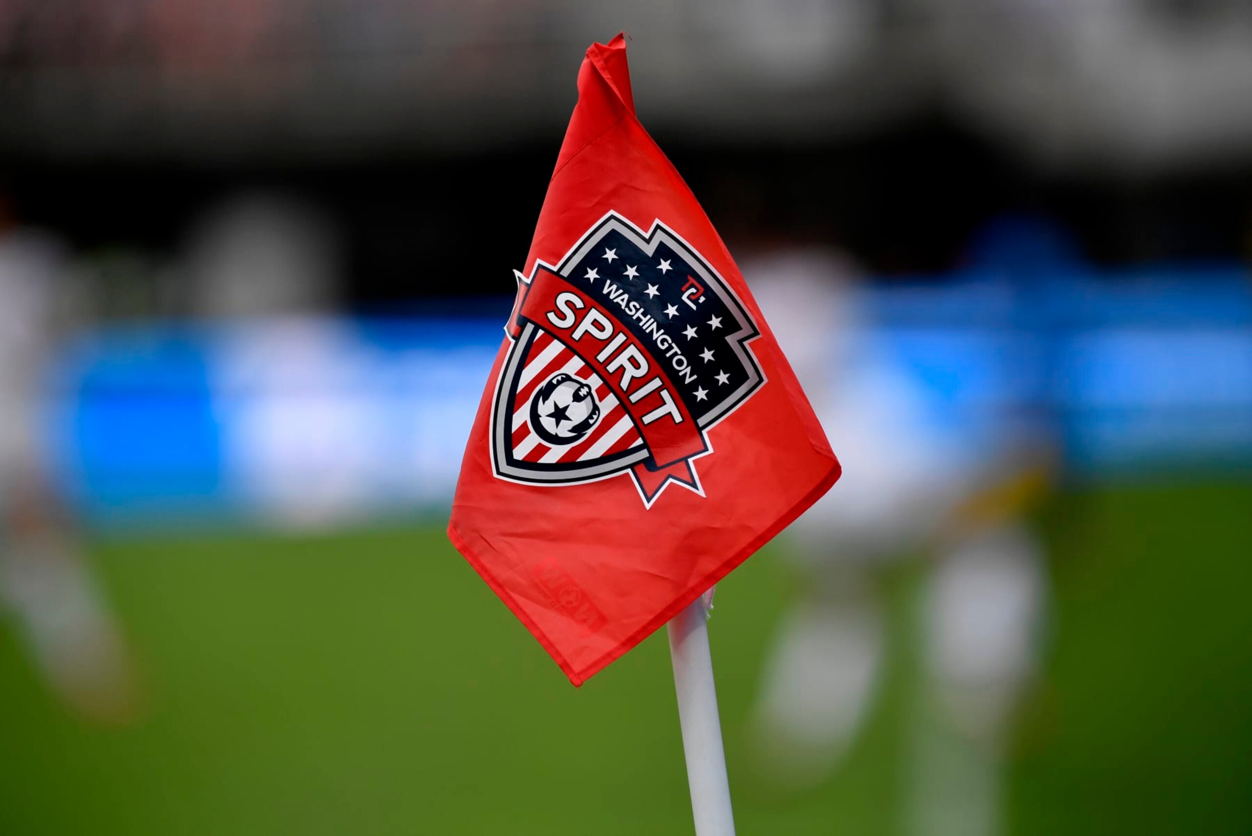 WASHINGTON, DC - AUGUST 22: A red soccer corner flag with the Washington Spirit shield logo on it is shown in close up during the NWSL game between Orlando Pride and Washington Spirit August 22, 2021 at Audi Field in Washington, DC. (Photo by Randy Litzinger/Icon Sportswire via Getty Images)