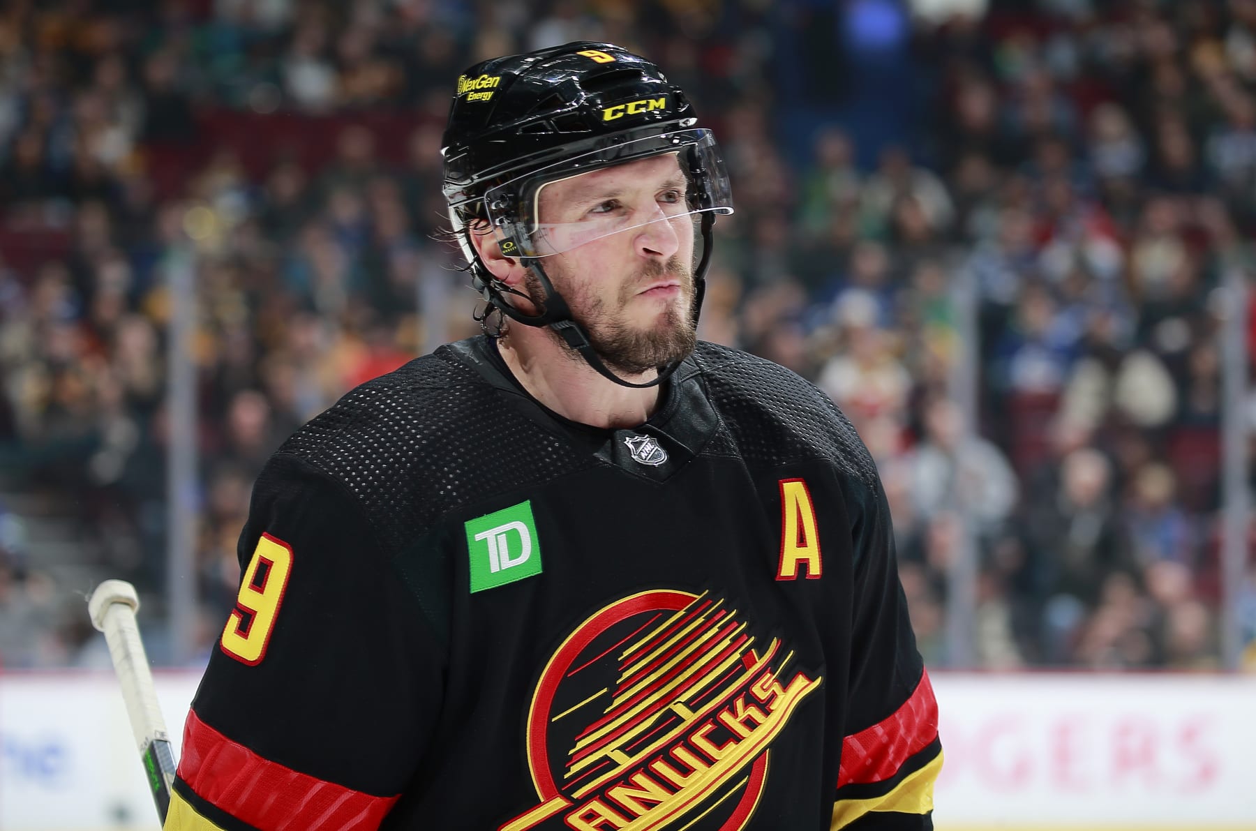 VANCOUVER, CANADA - FEBRUARY 25: J.T. Miller #9 of the Vancouver Canucks skates up ice during their NHL game against the Boston Bruins at Rogers Arena February 25, 2023 in Vancouver, British Columbia, Canada.  (Photo by Jeff Vinnick/NHLI via Getty Images)