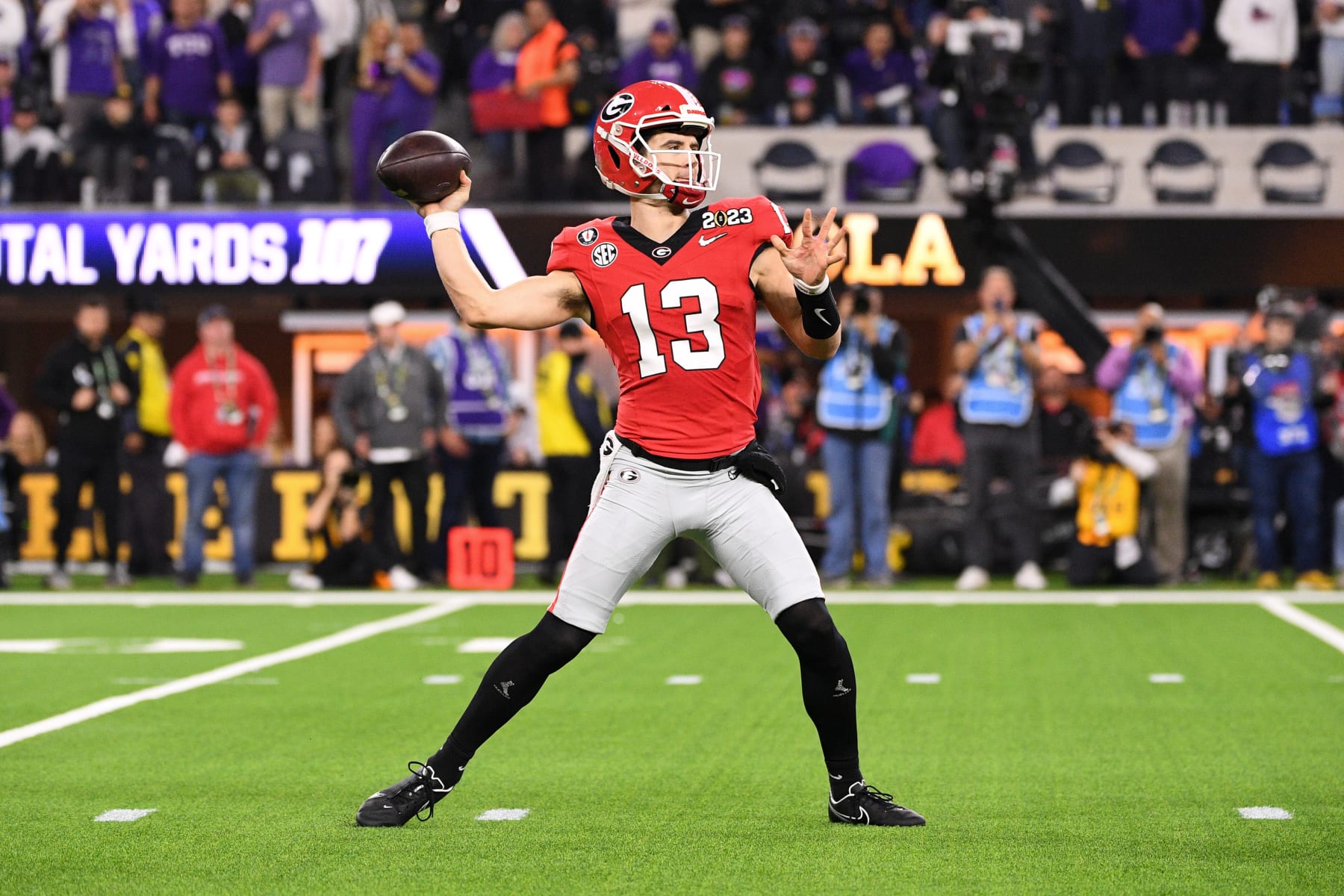 INGLEWOOD, CA - JANUARY 09: Georgia Bulldogs quarterback Stetson Bennett (13) throws a pass during the Georgia Bulldogs game versus the TCU Horned Frogs in the College Football Playoff National Championship game on January 9, 2023, at SoFi Stadium in Inglewood, CA. (Photo by Brian Rothmuller/Icon Sportswire via Getty Images)