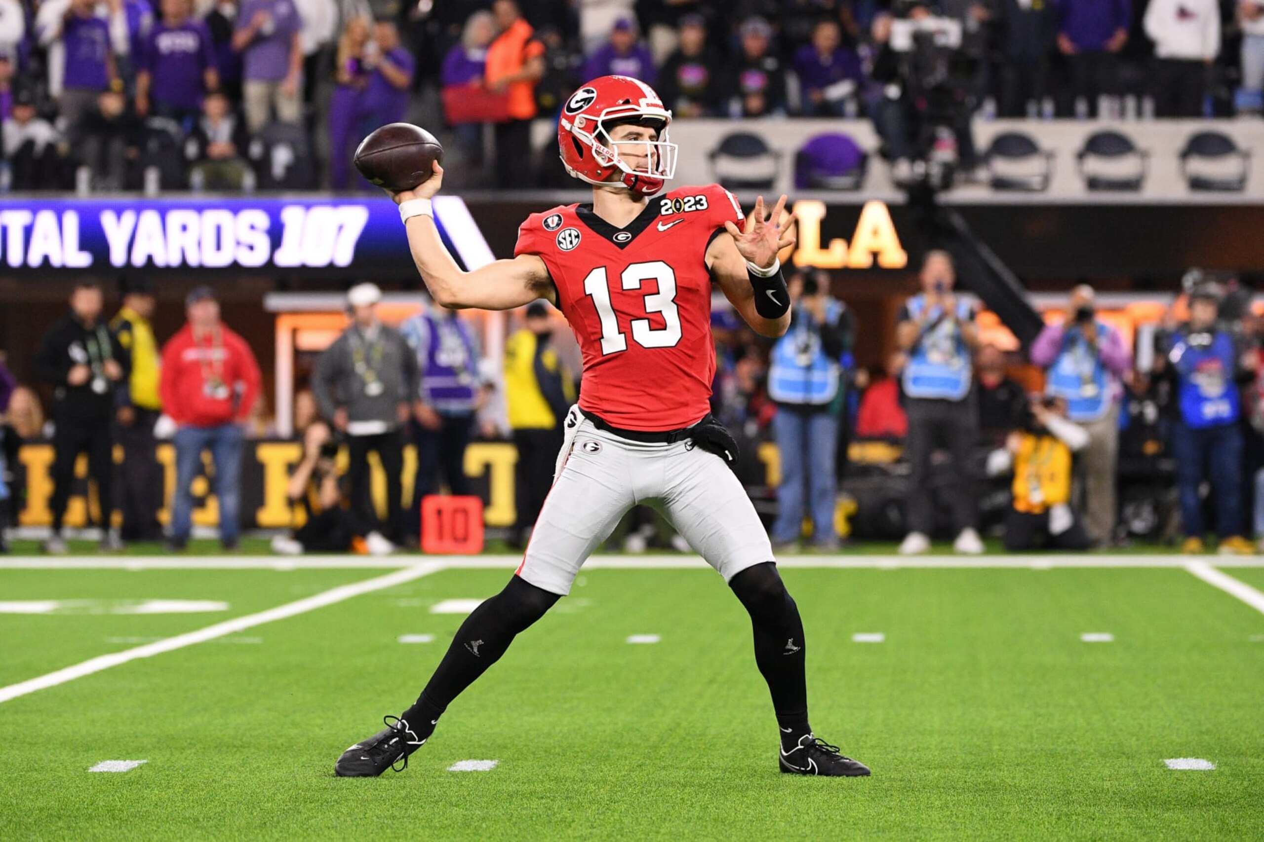 INGLEWOOD, CA - JANUARY 09: Georgia Bulldogs quarterback Stetson Bennett (13) throws a pass during the Georgia Bulldogs game versus the TCU Horned Frogs in the College Football Playoff National Championship game on January 9, 2023, at SoFi Stadium in Inglewood, CA. (Photo by Brian Rothmuller/Icon Sportswire via Getty Images) INGLEWOOD, CA - JANUARY 09: Georgia Bulldogs quarterback Stetson Bennett (13) throws a pass during the Georgia Bulldogs game versus the TCU Horned Frogs in the College Football Playoff National Championship game on January 9, 2023, at SoFi Stadium in Inglewood, CA. (Photo by Brian Rothmuller/Icon Sportswire via Getty Images)