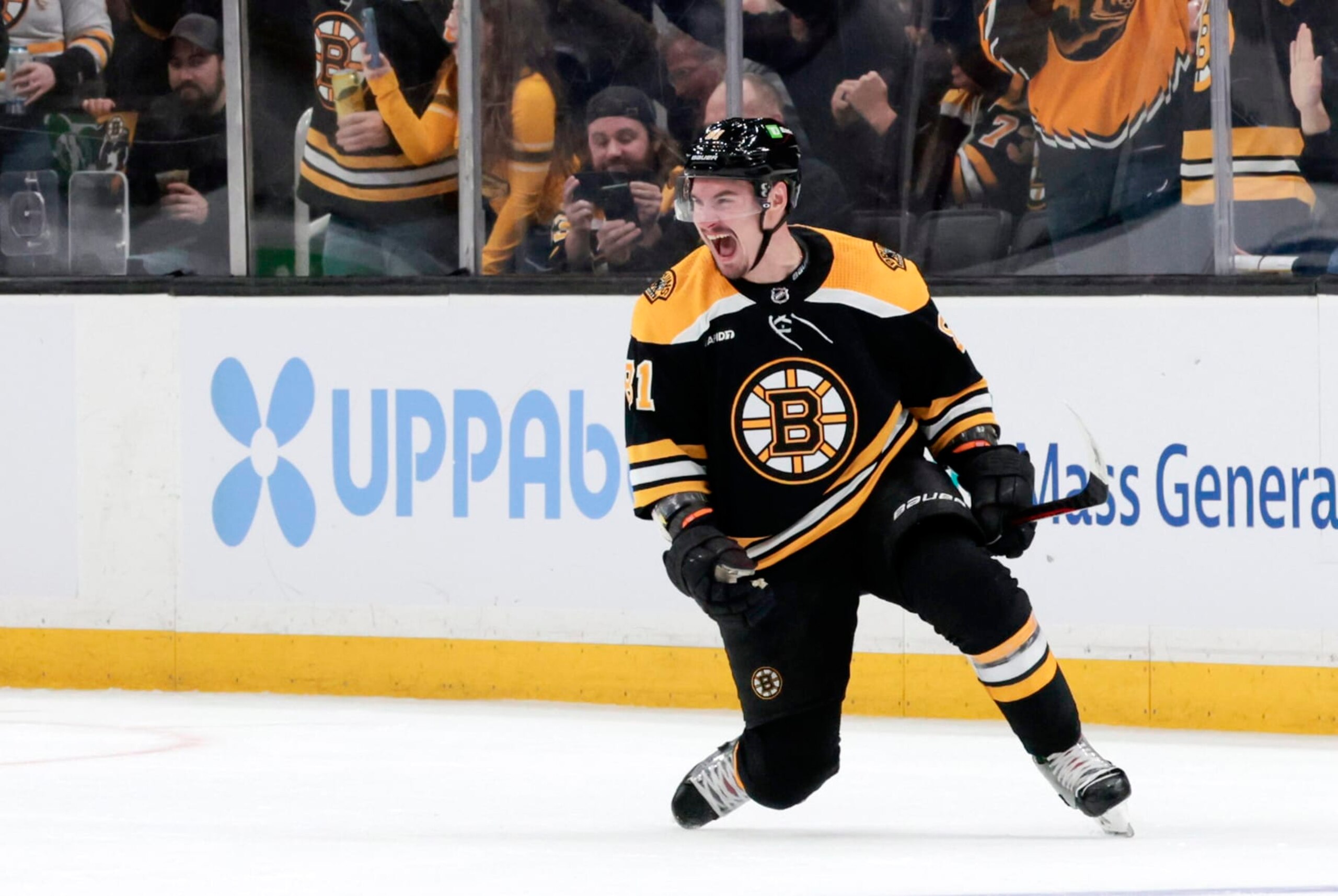 BOSTON, MA - MARCH 02: Boston Bruins defenseman Dmitry Orlov (81) reacts to his first goal as a Bruin during a game between the Boston Bruins and the Buffalo Sabres on March 2, 2023, at TD Garden in Boston, Massachusetts. (Photo by Fred Kfoury III/Icon Sportswire via Getty Images)