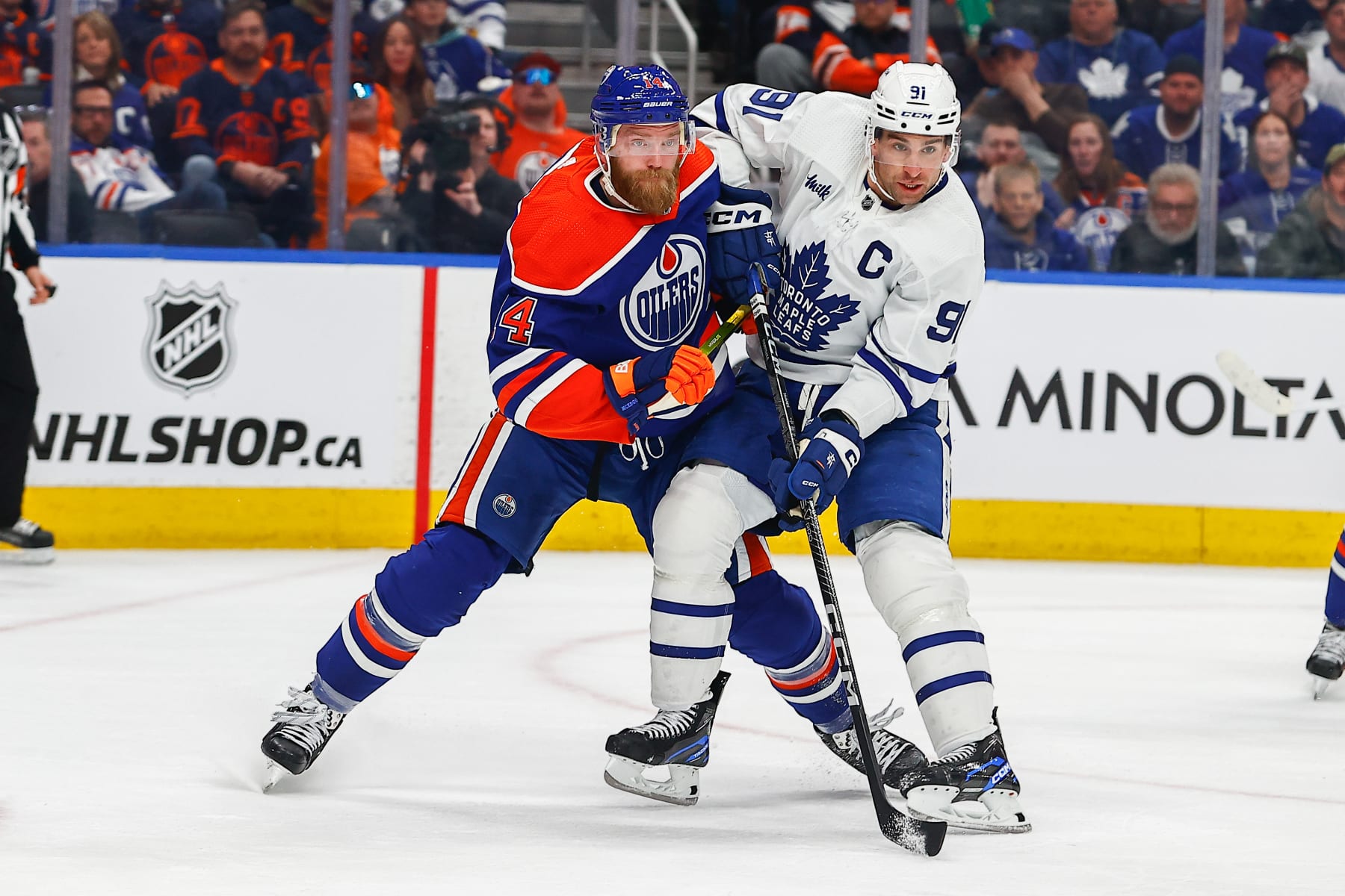 EDMONTON, AB - MARCH 01: Edmonton Oilers Defenceman Mattias Ekholm (14) in his first game as an Oilers battles Toronto Maple Leafs Left Wing John Tavares (91) in the second period of the Edmonton Oilers game versus the Toronto Maple Leads on March 1, 2023 at Rogers Place in Edmonton, AB. (Photo by Curtis Comeau/Icon Sportswire via Getty Images)