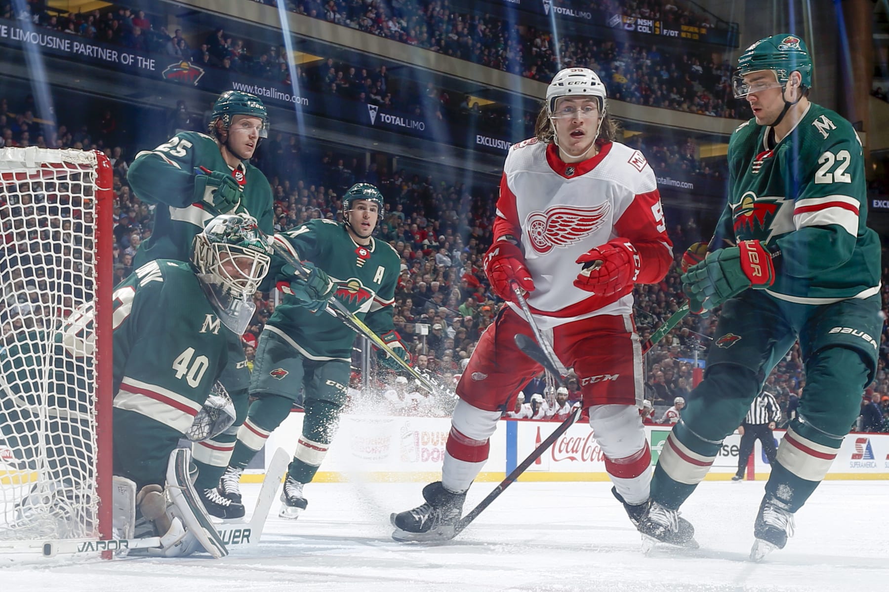 ST. PAUL, MN - MARCH 4:  Jonas Brodin #25, Zach Parise #11, Nino Niederreiter #22 and goalie Devan Dubnyk #40 of the Minnesota Wild defend against Tyler Bertuzzi #59 of the Detroit Red Wings during the game at the Xcel Energy Center on March 4, 2018 in St. Paul, Minnesota.  (Photo by Bruce Kluckhohn/NHLI via Getty Images)