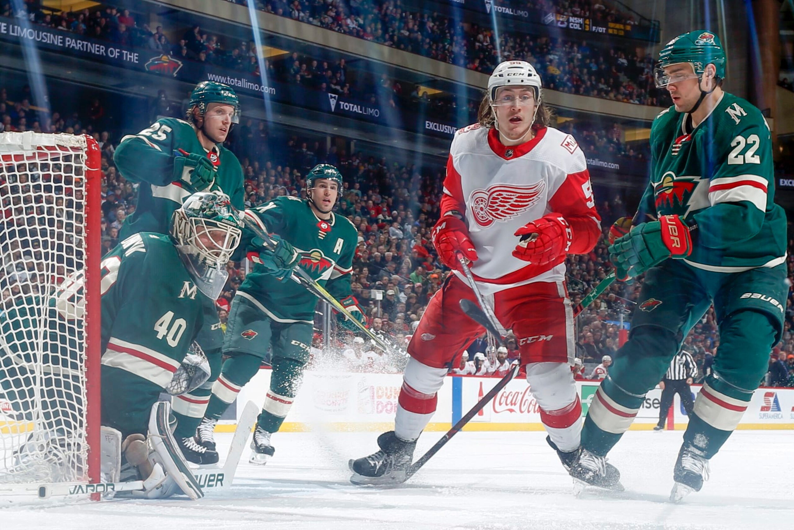 ST. PAUL, MN - MARCH 4:  Jonas Brodin #25, Zach Parise #11, Nino Niederreiter #22 and goalie Devan Dubnyk #40 of the Minnesota Wild defend against Tyler Bertuzzi #59 of the Detroit Red Wings during the game at the Xcel Energy Center on March 4, 2018 in St. Paul, Minnesota.  (Photo by Bruce Kluckhohn/NHLI via Getty Images)