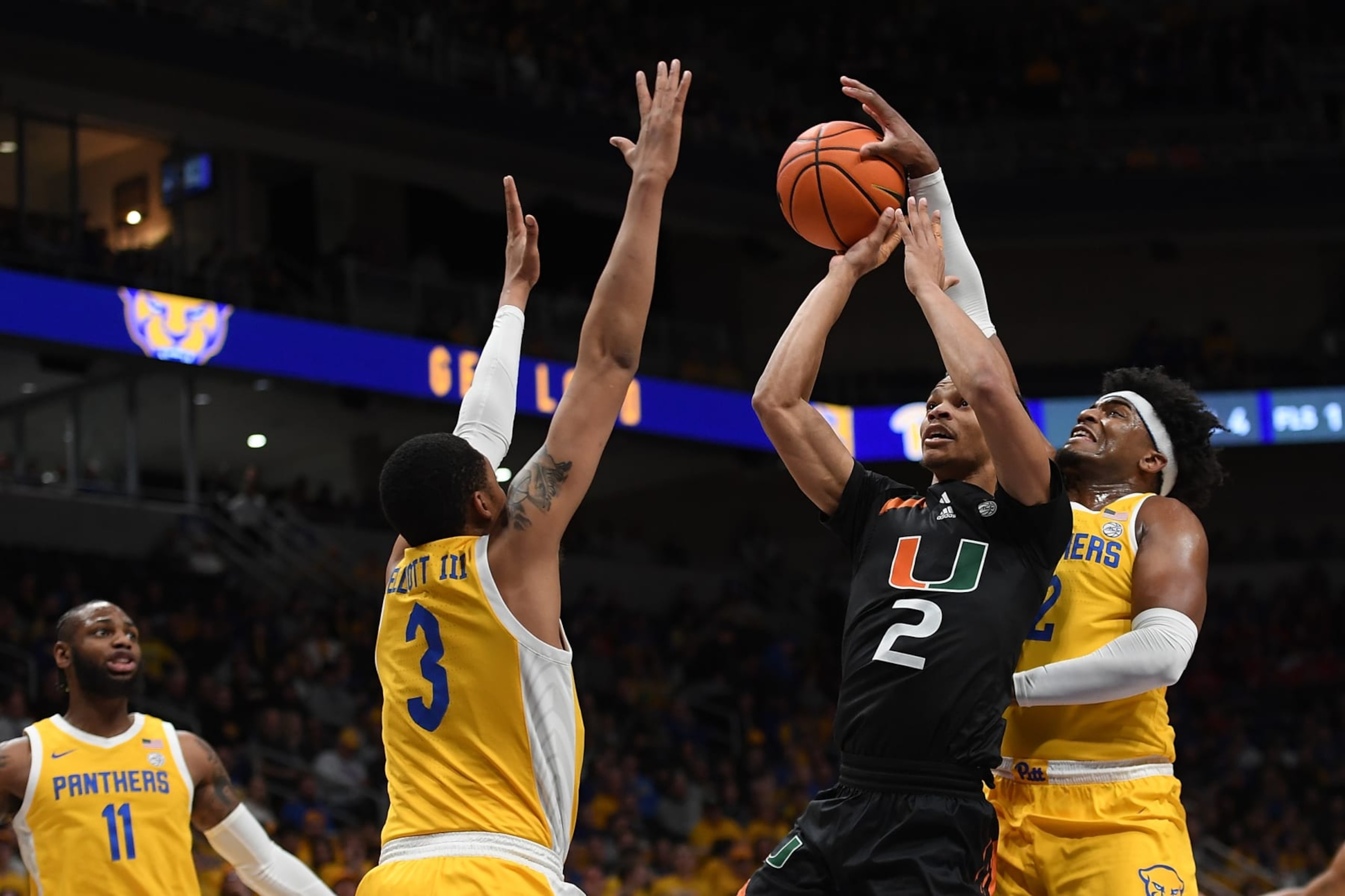 PITTSBURGH, PA - JANUARY 28: Isaiah Wong #2 of the Miami Hurricanes has his shot blocked by Blake Hinson #2 of the Pittsburgh Panthers in the first half during the game at Petersen Events Center on January 28, 2023 in Pittsburgh, Pennsylvania. (Photo by Justin Berl/Getty Images)