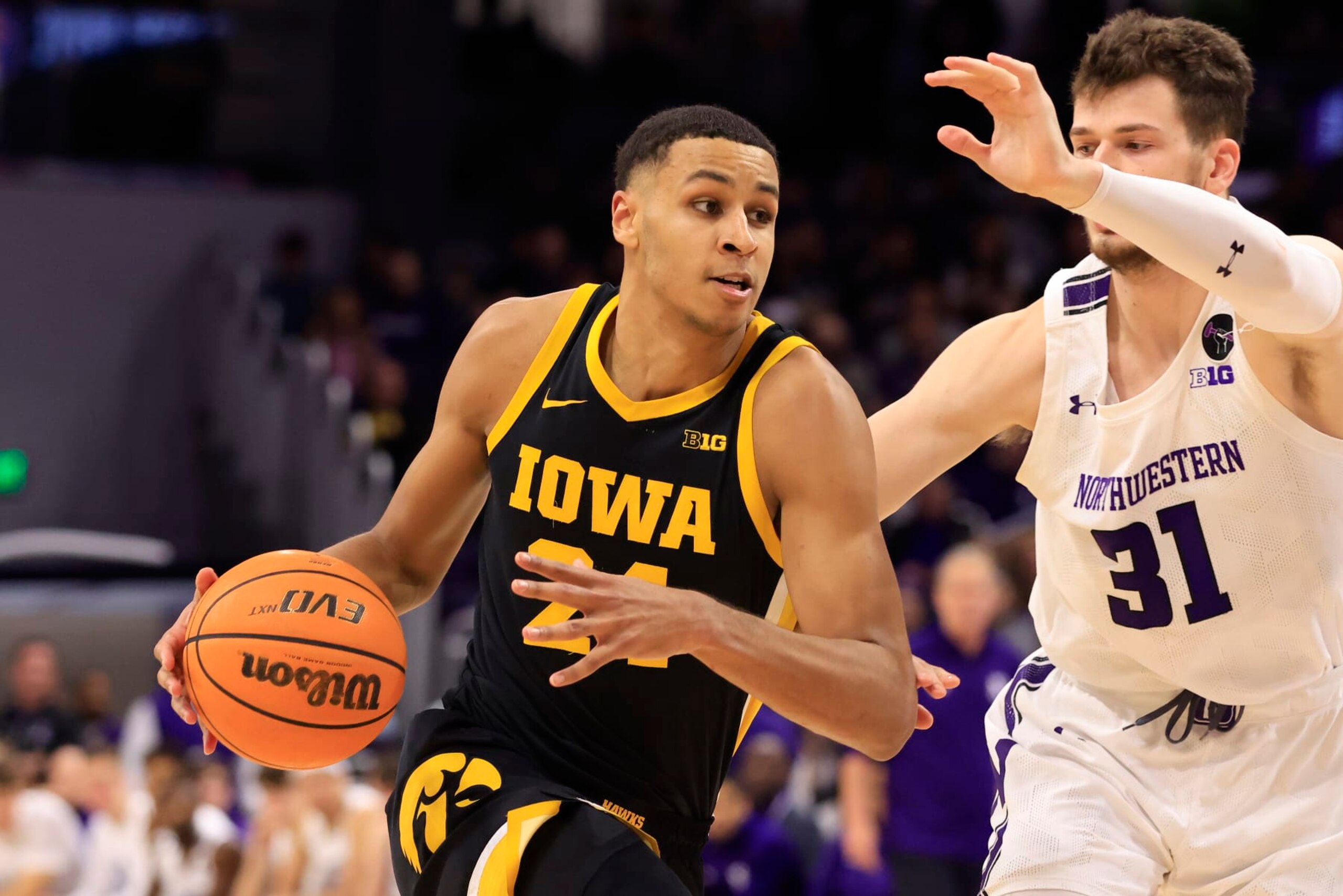 EVANSTON, ILLINOIS - FEBRUARY 19: Kris Murray #24 of the Iowa Hawkeyes drives to the basket in the game against the Northwestern Wildcats at Welsh-Ryan Arena on February 19, 2023 in Evanston, Illinois. (Photo by Justin Casterline/Getty Images)