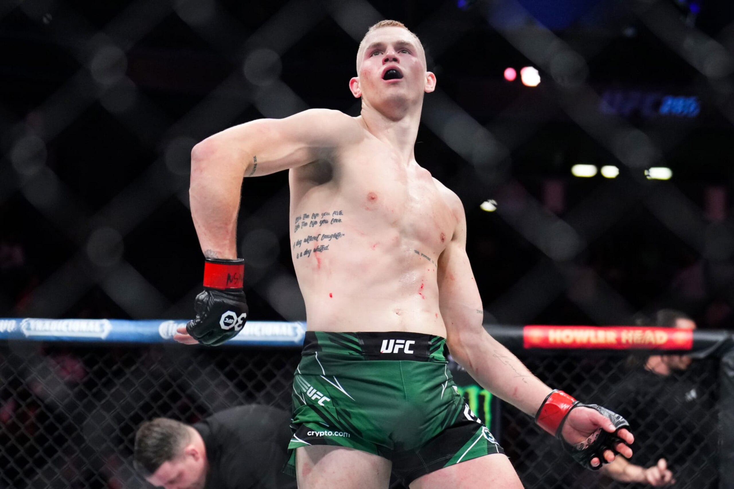 LAS VEGAS, NEVADA - MARCH 04: Ian Garry of Ireland celebrates his win over Song Kenan of China in a welterweight fight during the UFC 285 event at T-Mobile Arena on March 04, 2023 in Las Vegas, Nevada. (Photo by Chris Unger/Zuffa LLC via Getty Images)