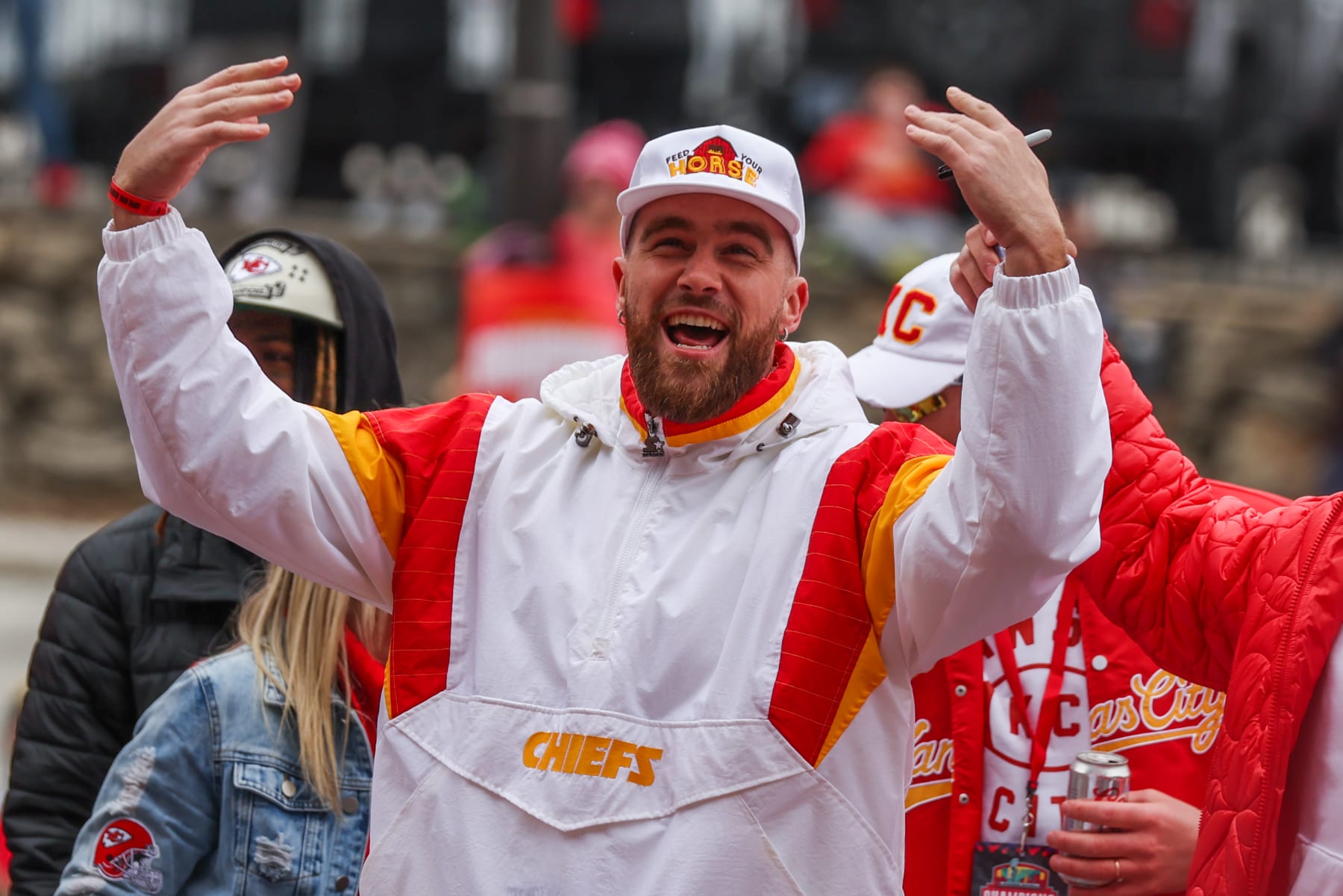 KANSAS CITY, MO - FEBRUARY 15: Kansas City Chiefs tight end Travis Kelce (87) raises his hands to fire up the crowd during the Chiefs Super Bowl LVII Victory Parade on February 15, 2023 in Kansas City, MO. (Photo by Scott Winters/Icon Sportswire via Getty Images)