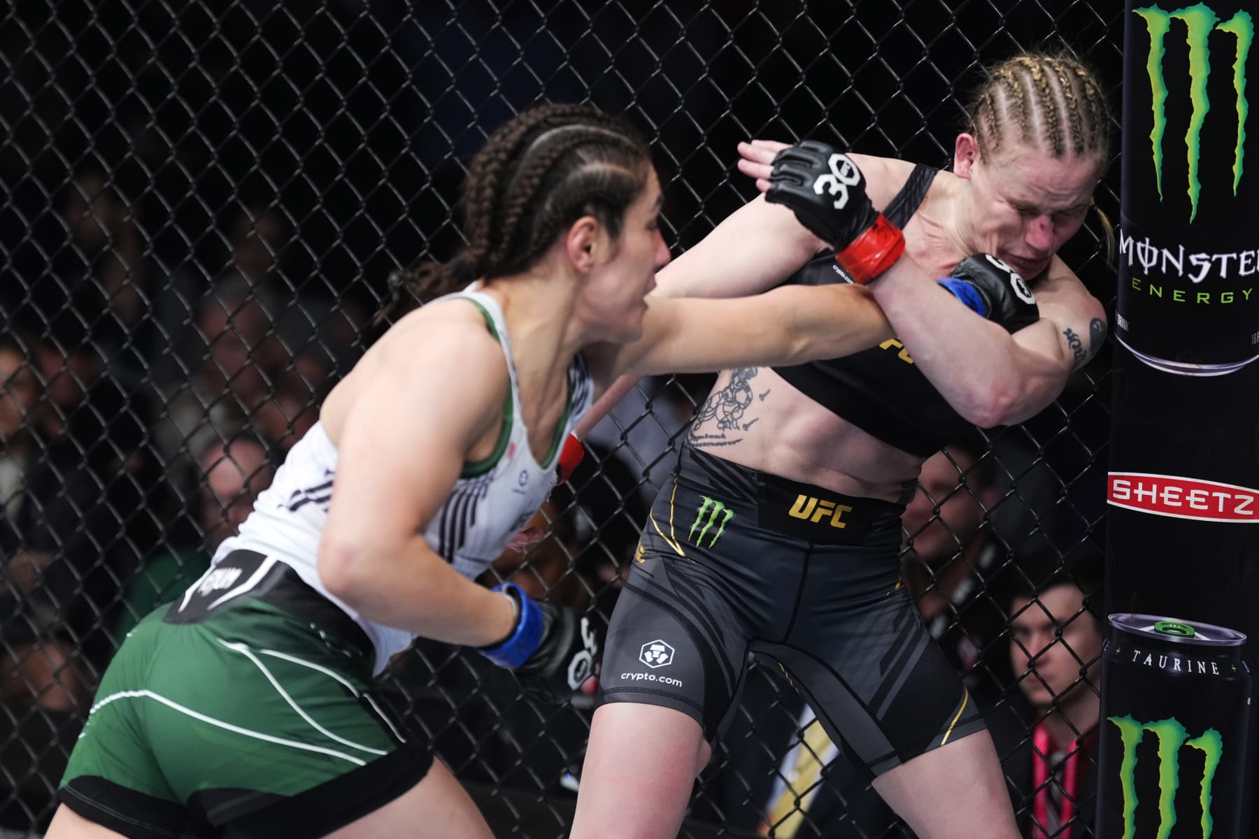 LAS VEGAS, NEVADA - MARCH 04: (L-R) Alexa Grasso of Mexico punches Valentina Shevchenko of Kyrgyzstan in the UFC flyweight championship fight during the UFC 285 event at T-Mobile Arena on March 04, 2023 in Las Vegas, Nevada. (Photo by Jeff Bottari/Zuffa LLC via Getty Images)