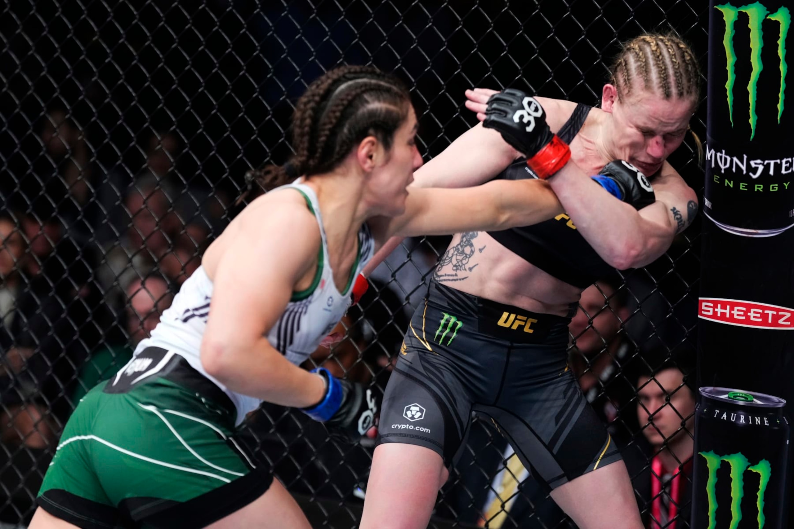 LAS VEGAS, NEVADA - MARCH 04: (L-R) Alexa Grasso of Mexico punches Valentina Shevchenko of Kyrgyzstan in the UFC flyweight championship fight during the UFC 285 event at T-Mobile Arena on March 04, 2023 in Las Vegas, Nevada. (Photo by Jeff Bottari/Zuffa LLC via Getty Images)