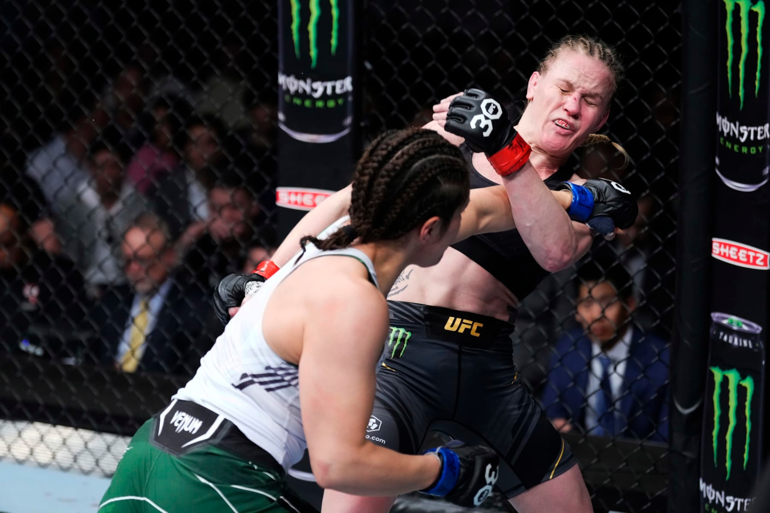 LAS VEGAS, NEVADA - MARCH 04: (L-R) Alexa Grasso of Mexico punches Valentina Shevchenko of Kyrgyzstan in the UFC flyweight championship fight during the UFC 285 event at T-Mobile Arena on March 04, 2023 in Las Vegas, Nevada. (Photo by Jeff Bottari/Zuffa LLC via Getty Images)