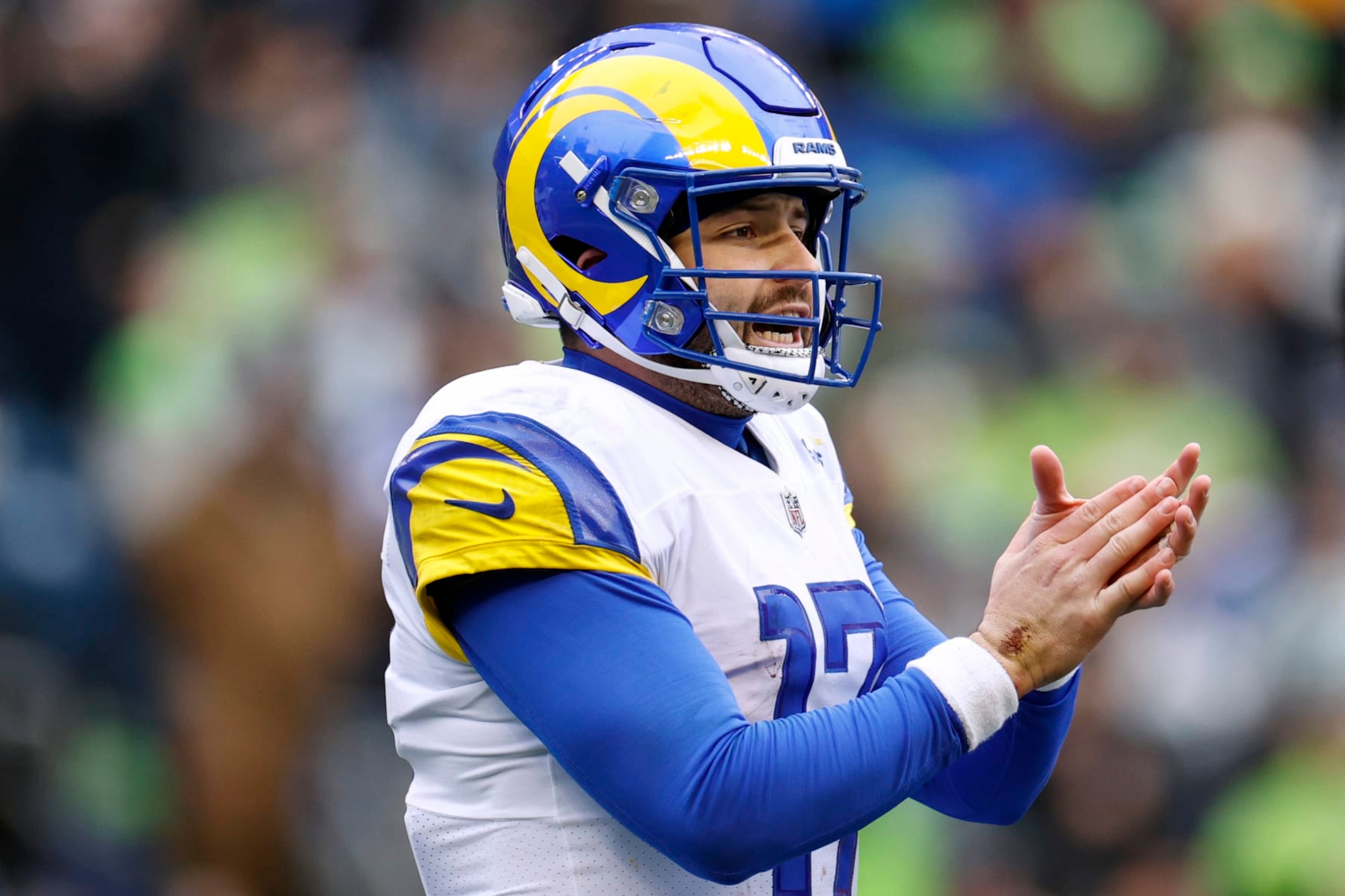 SEATTLE, WASHINGTON - JANUARY 08: Baker Mayfield #17 of the Los Angeles Rams reacts during the first half against the Seattle Seahawks at Lumen Field on January 08, 2023 in Seattle, Washington. (Photo by Steph Chambers/Getty Images)