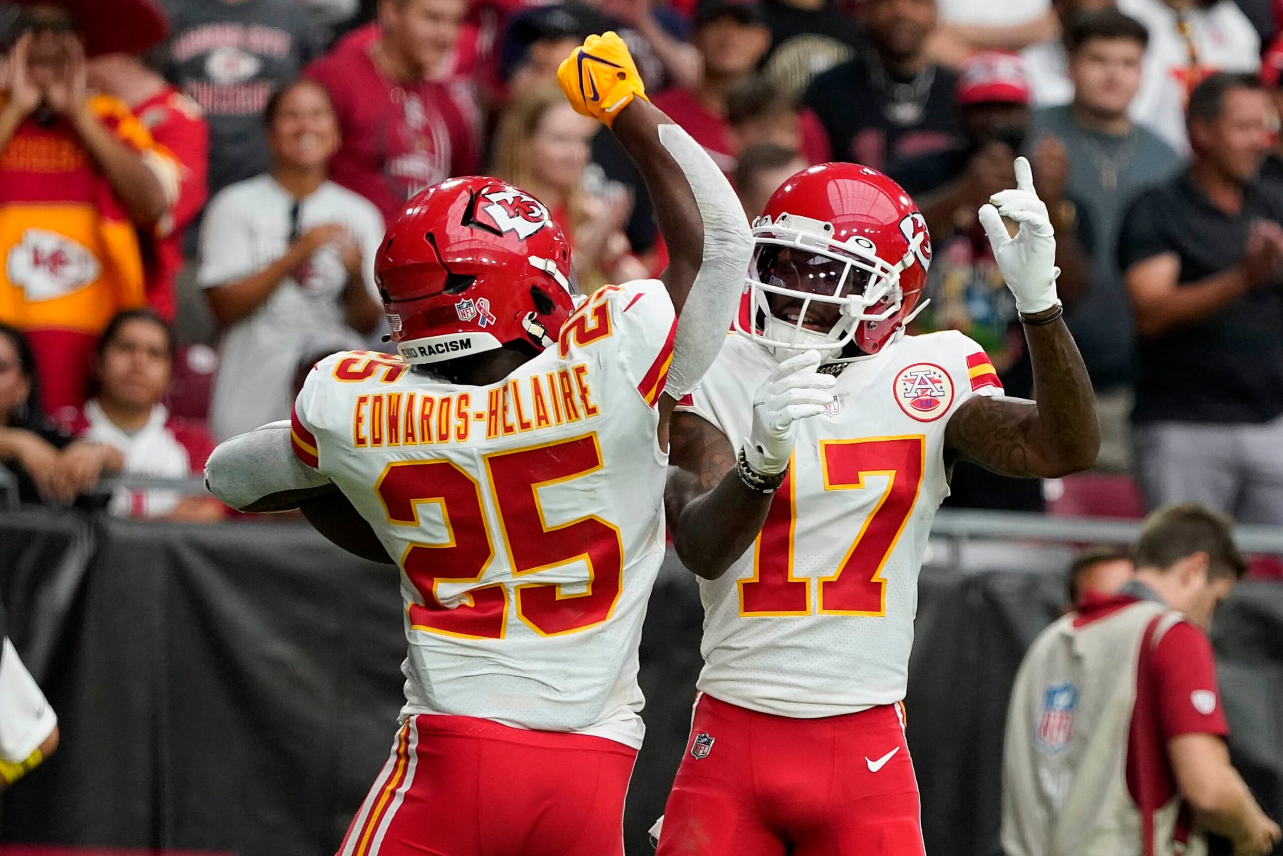 Kansas City Chiefs running back Clyde Edwards-Helaire (25) celebrates his touchdown with Mecole Hardman (17) during the first half of an NFL football game against the Arizona Cardinals, Sunday, Sept. 11, 2022, in Glendale, Ariz. (AP Photo/Darryl Webb)