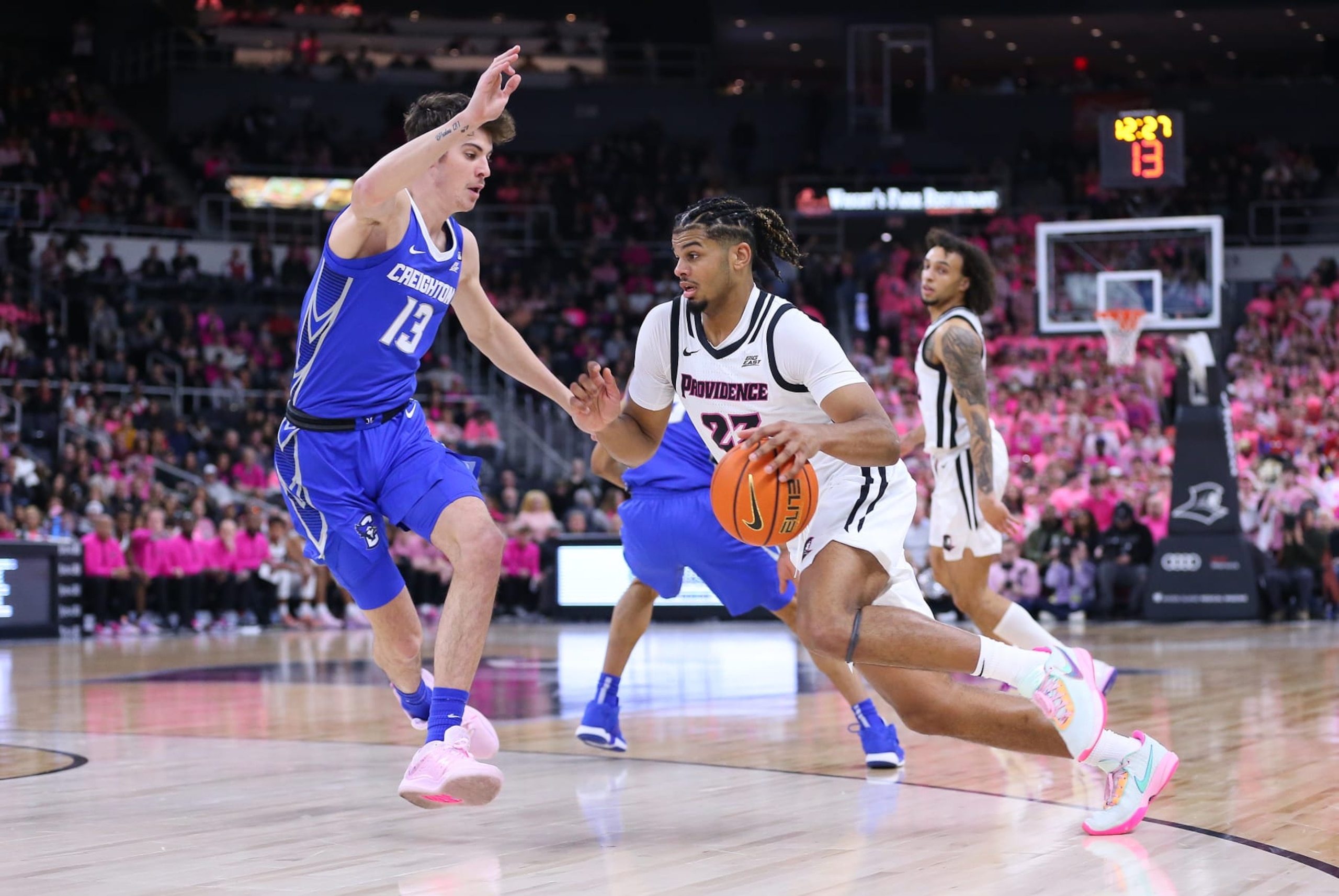 Bryce Hopkins drives against Creighton. Bryce Hopkins drives against Creighton.