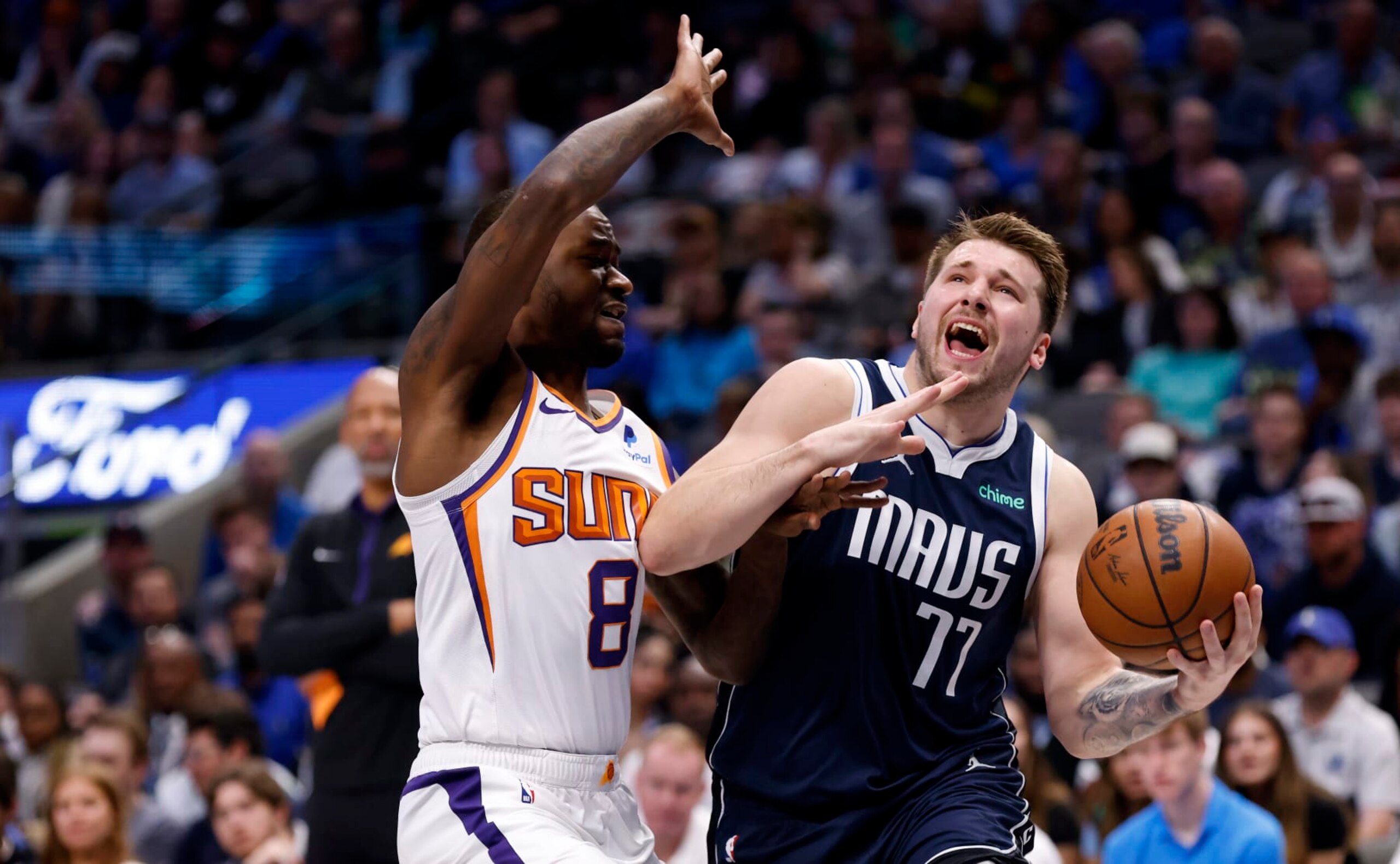 DALLAS, TX - MARCH 5: Luka Doncic #77 of the Dallas Mavericks goes to the basket as Terrence Ross #8 of the Phoenix Suns defends in the first half of the game at American Airlines Center on March 5, 2023 in Dallas, Texas. NOTE TO USER: User expressly acknowledges and agrees that, by downloading and or using this photograph, User is consenting to the terms and conditions of the Getty Images License Agreement. (Photo by Ron Jenkins/Getty Images) DALLAS, TX - MARCH 5: Luka Doncic #77 of the Dallas Mavericks goes to the basket as Terrence Ross #8 of the Phoenix Suns defends in the first half of the game at American Airlines Center on March 5, 2023 in Dallas, Texas. NOTE TO USER: User expressly acknowledges and agrees that, by downloading and or using this photograph, User is consenting to the terms and conditions of the Getty Images License Agreement. (Photo by Ron Jenkins/Getty Images)