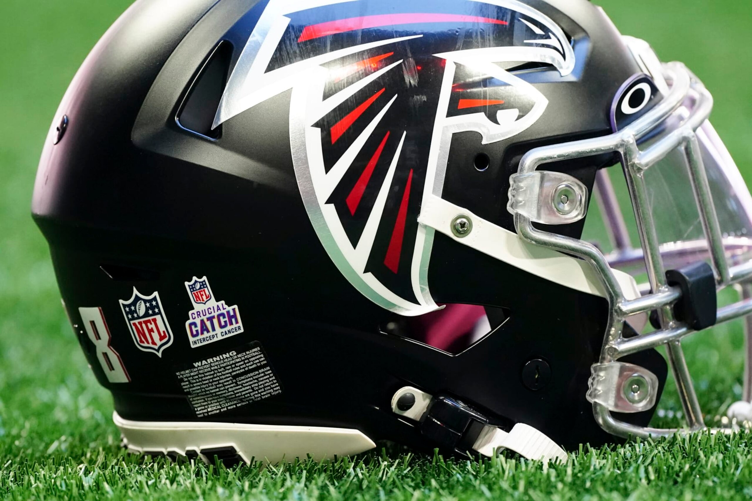 The logo for the NFL's Cancer Prevention initiative "Critical Catch" is shown on the helmet of an Atlanta Falcon before an NFL football game against the Cleveland Browns Sunday, Oct. 2, 2022, in Atlanta. (AP Photo/John Bazemore)