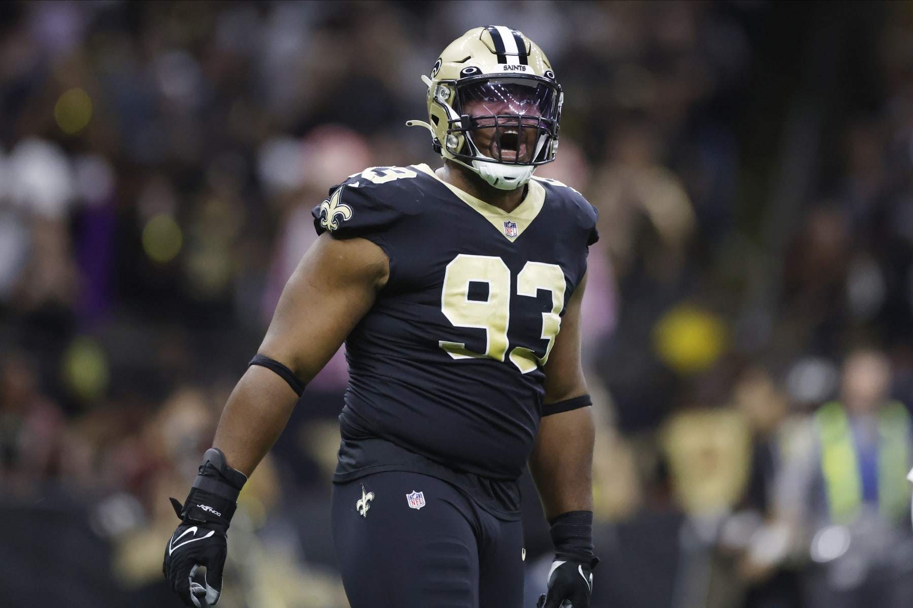 New Orleans Saints defensive tackle David Onyemata (93) celebrates after a play during the first half of an NFL football game against the Las Vegas Raiders Sunday, Oct. 30, 2022, in New Orleans. (AP Photo/Rusty Costanza)