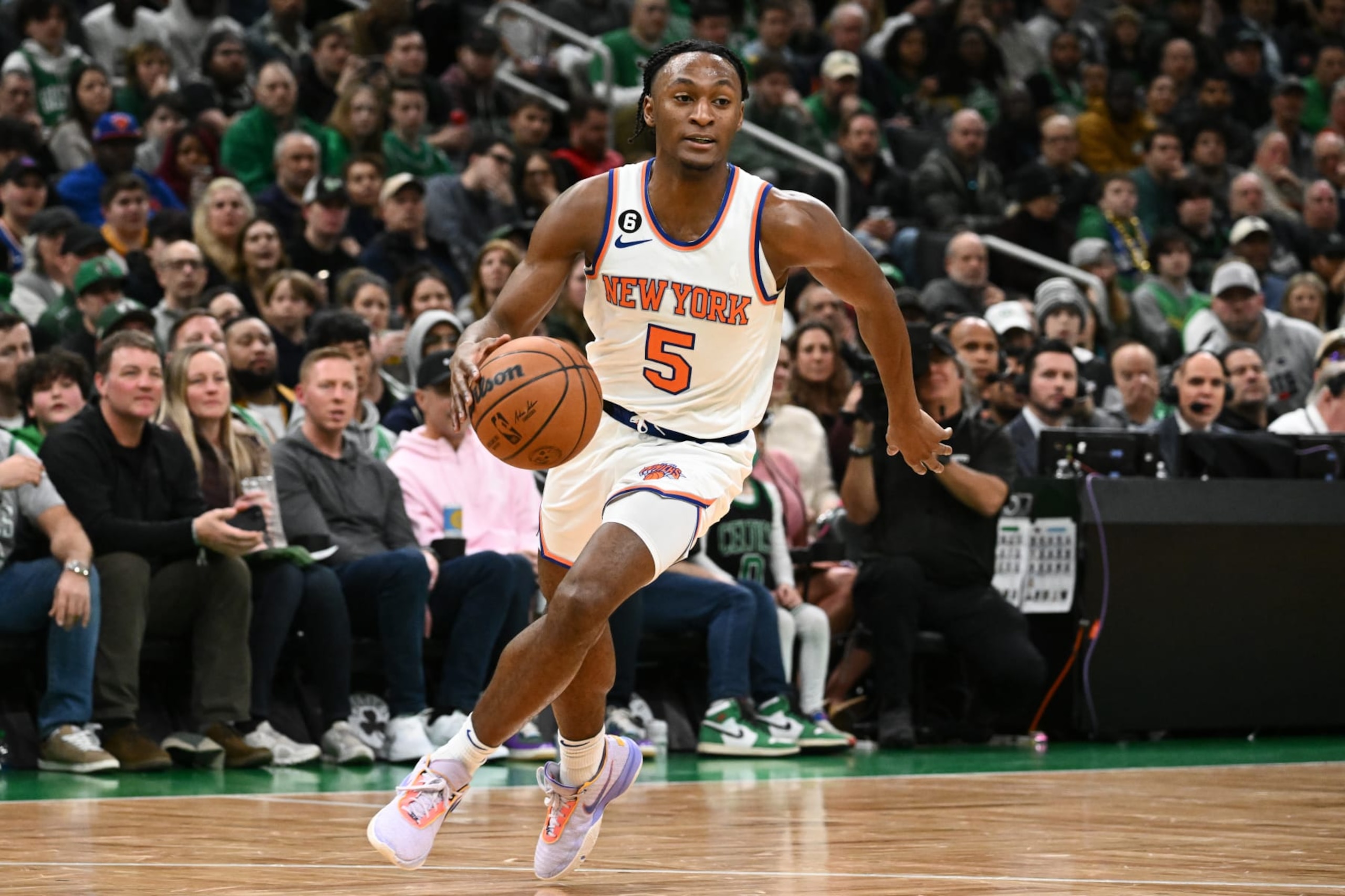 BOSTON, MASSACHUSETTS - MARCH 05: Immanuel Quickley #5 of the New York Knicks drives to the basket against the Boston Celtics during the first quarter at the TD Garden on March 05, 2023 in Boston, Massachusetts. NOTE TO USER: User expressly acknowledges and agrees that, by downloading and or using this photograph, User is consenting to the terms and conditions of the Getty Images License Agreement. (Photo by Brian Fluharty/Getty Images)