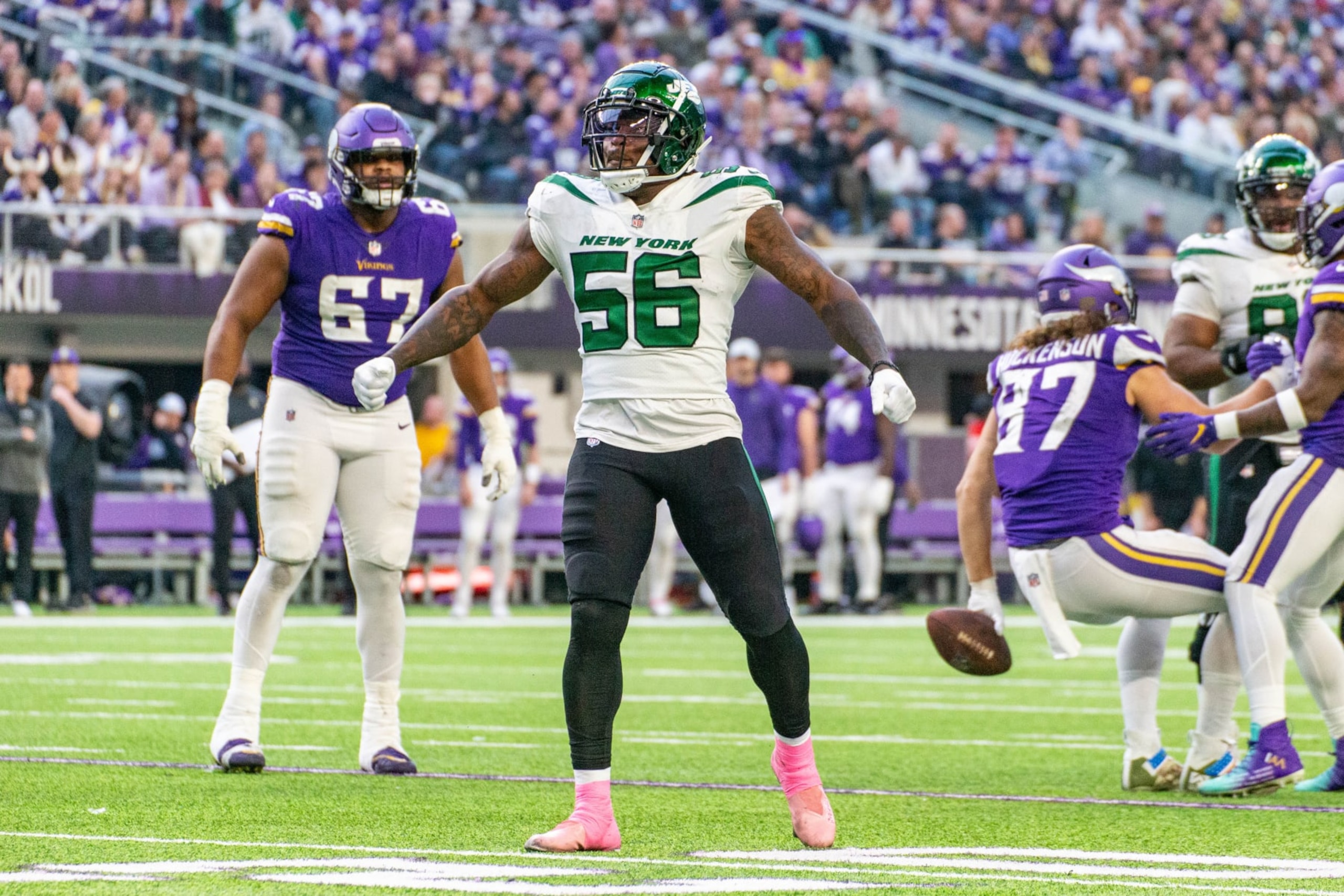 MINNEAPOLIS, MN - DECEMBER 04: New York Jets linebacker Quincy Williams (56) celebrates a hit during the NFL game between the New York Jets and the Minnesota Vikings on December 4th, 2022, at U.S. Bank Stadium, in Minneapolis, MN. (Photo by Bailey Hillesheim/Icon Sportswire via Getty Images)
