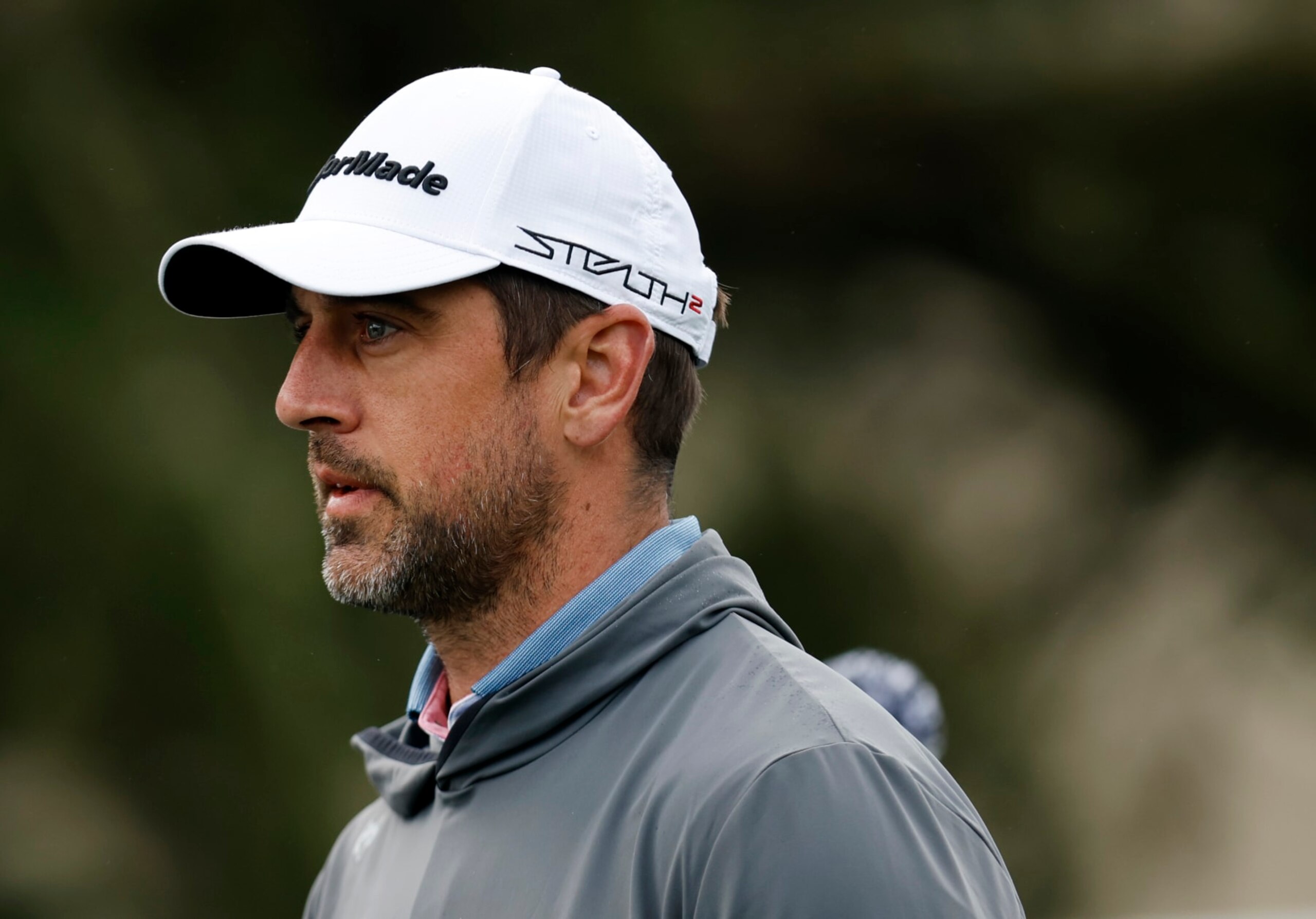 PEBBLE BEACH, CALIFORNIA - FEBRUARY 04: Aaron Rodgers walks from the first tee during the third round of the AT&T Pebble Beach Pro-Am at Pebble Beach Golf Links on February 04, 2023 in Pebble Beach, California. (Photo by Jed Jacobsohn/Getty Images)