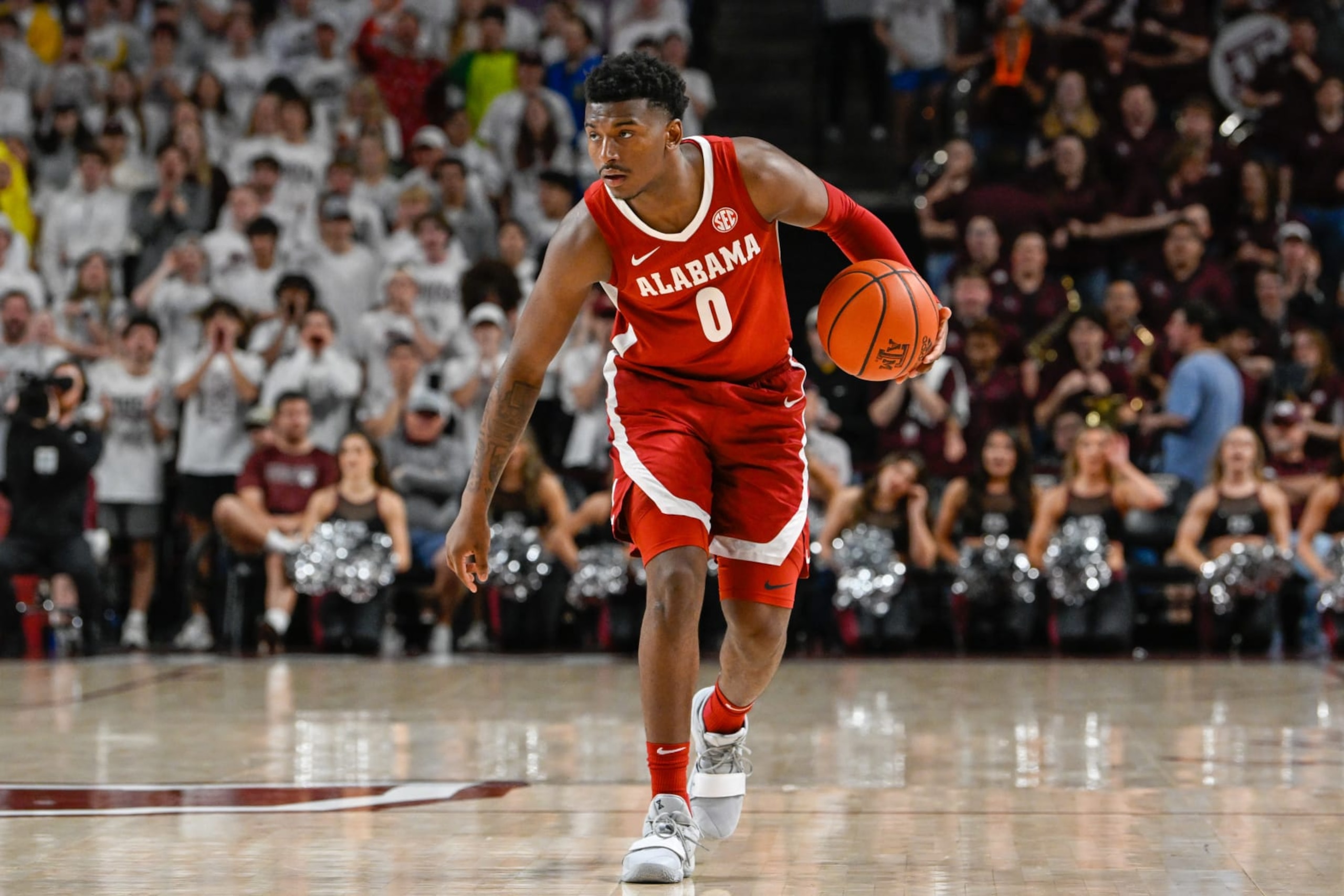 COLLEGE STATION, TX - MARCH 04: Alabama Crimson Tide guard Jaden Bradley (0) brings the ball up the court during the basketball game between the Alabama Crimson Tide and Texas A&M Aggies at Reed Arena on March 4, 2023 in College Station, Texas. (Photo by Ken Murray/Icon Sportswire via Getty Images)