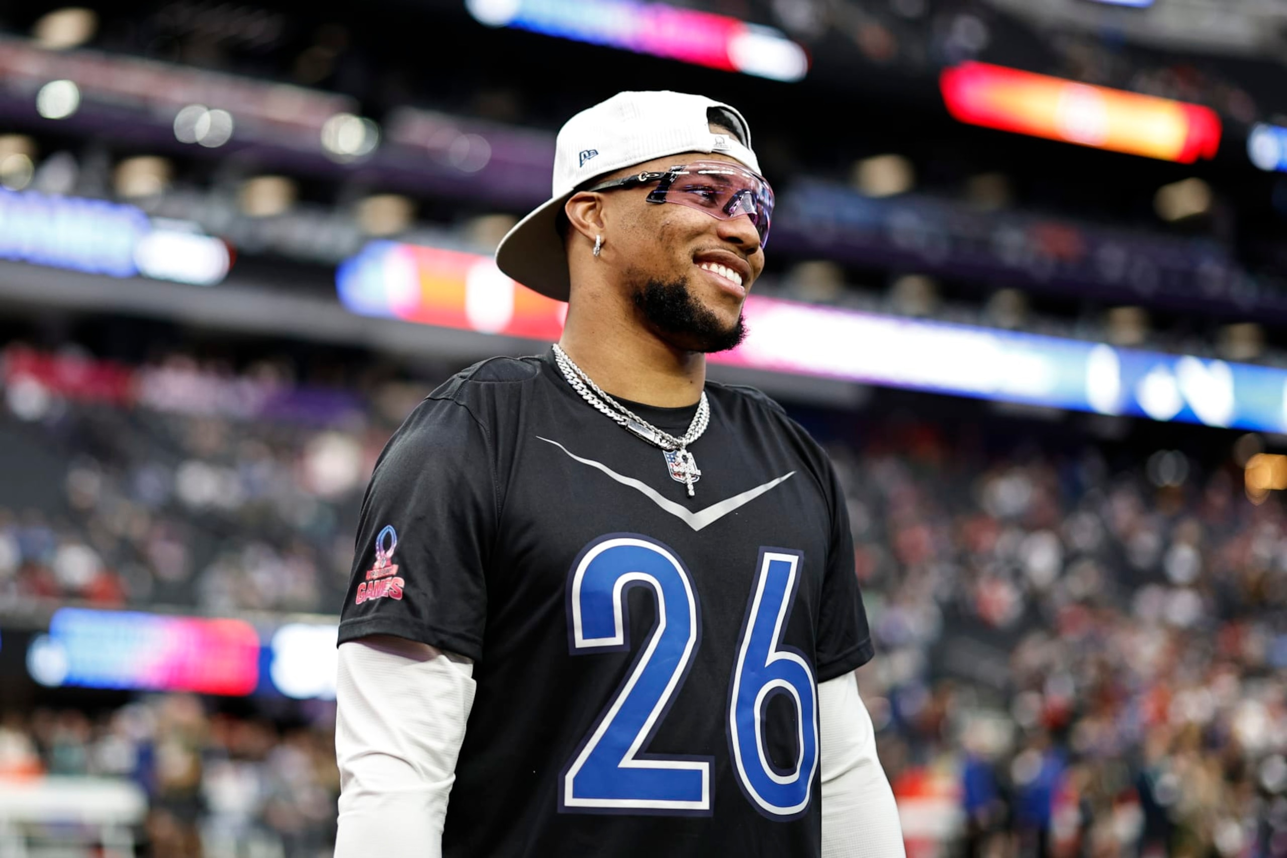 LAS VEGAS, NEVADA - FEBRUARY 05: LAS VEGAS, NEVADA - FEBRUARY 05: NFC running back Saquon Barkley #26 of the New York Giants reacts as he warms up prior to an NFL Pro Bowl football game at Allegiant Stadium on February 05, 2023 in Las Vegas, Nevada. (Photo by Michael Owens/Getty Images) LAS VEGAS, NEVADA - FEBRUARY 05: LAS VEGAS, NEVADA - FEBRUARY 05: NFC running back Saquon Barkley #26 of the New York Giants reacts as he warms up prior to an NFL Pro Bowl football game at Allegiant Stadium on February 05, 2023 in Las Vegas, Nevada. (Photo by Michael Owens/Getty Images)