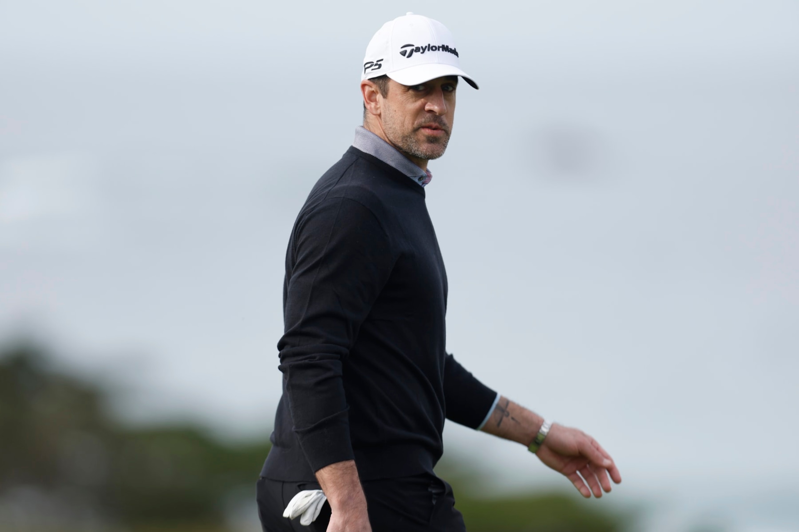 PEBBLE BEACH, CALIFORNIA - FEBRUARY 02: Aaron Rodgers walks on the course during the first round of the AT&T Pebble Beach Pro-Am at Spyglass Hill Golf Course on February 02, 2023 in Pebble Beach, California. (Photo by Jed Jacobsohn/Getty Images)