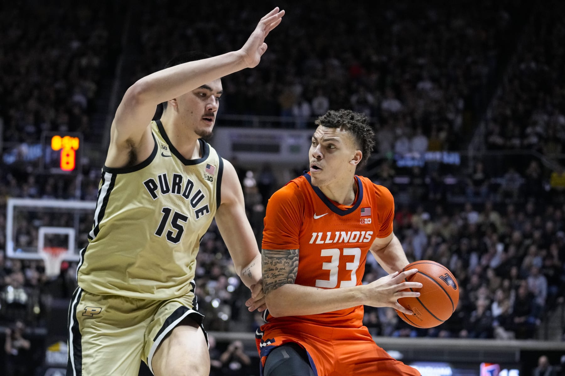 Purdue's Zach Edey and Illinois' Coleman Hawkins
