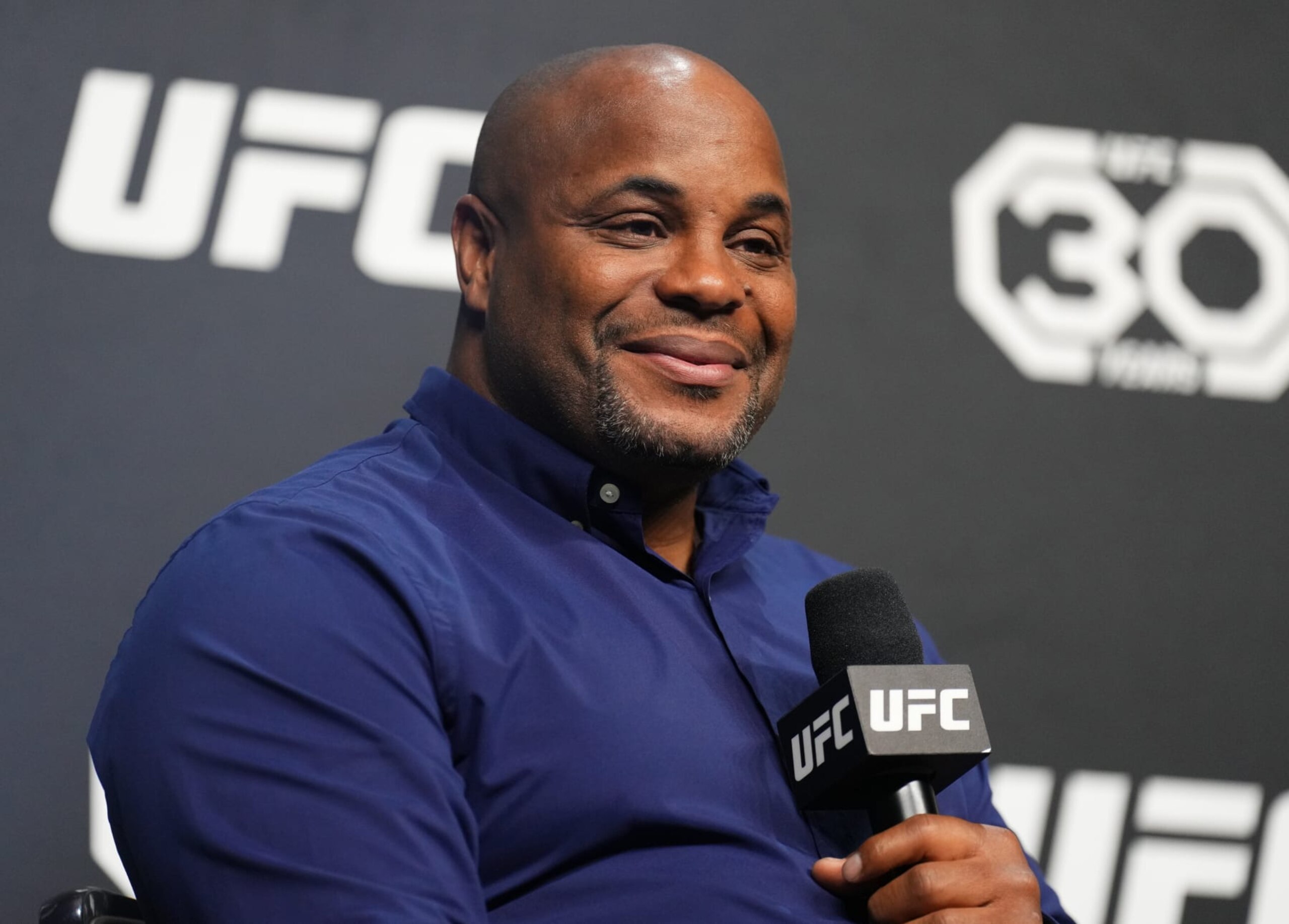 LAS VEGAS, NEVADA - MARCH 03: Former UFC two-division champion Daniel Cormier is seen on stage during the UFC 30th Anniversary Q&A session at MGM Grand Garden Arena on March 03, 2023 in Las Vegas, Nevada. (Photo by Chris Unger/Zuffa LLC via Getty Images)