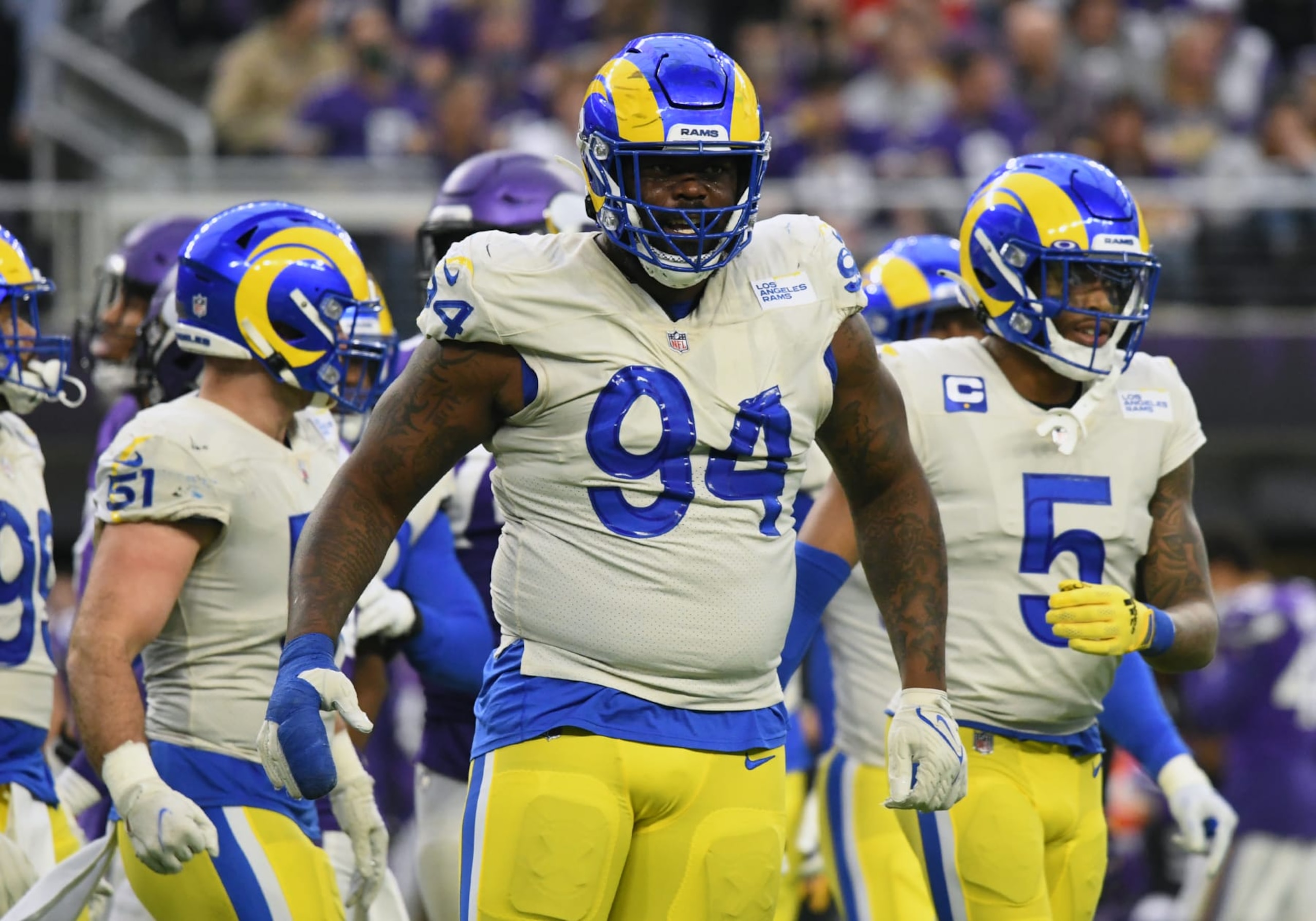 MINNEAPOLIS, MN - DECEMBER 26:  Los Angeles Rams Defensive End A'Shawn Robinson (94) celebrates a tackle during a game between the Minnesota Vikings and Los Angeles Rams on December 26, 2021, at U.S. Bank Stadium in Minneapolis, MN.(Photo by Nick Wosika/Icon Sportswire via Getty Images)