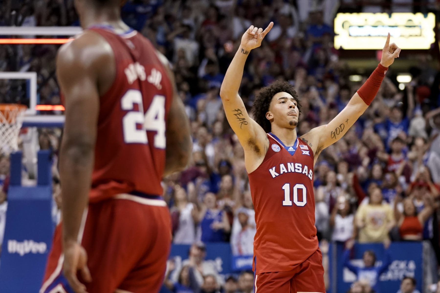 LAWRENCE, KANSAS - FEBRUARY 28: Jalen Wilson #10 of the Kansas Jayhawks celebrates a 67-63 win against the Texas Tech Red Raiders at Allen Fieldhouse on February 28, 2023 in Lawrence, Kansas. (Photo by Ed Zurga/Getty Images)