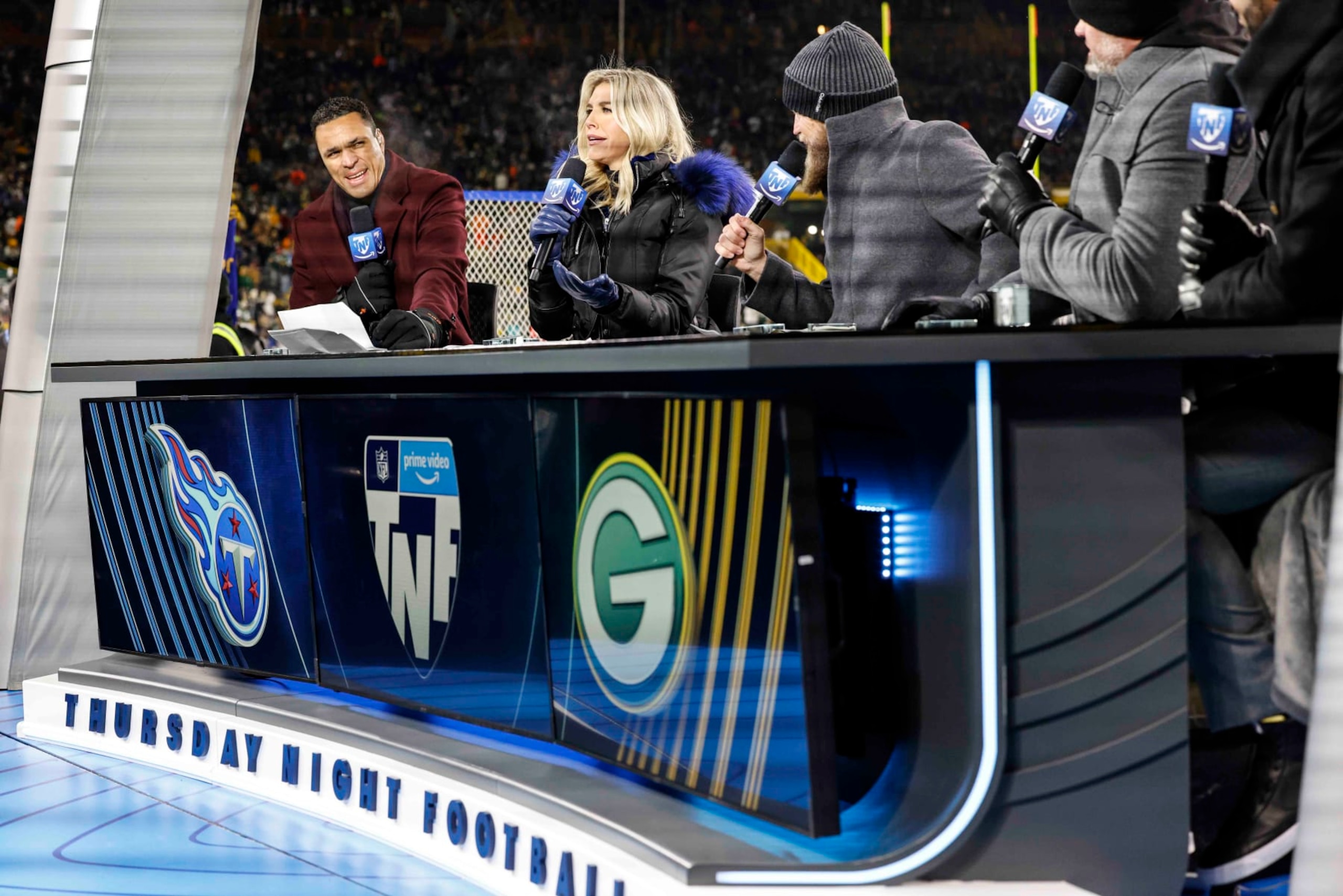 Thursday night football crew before an NFL football game between the Tennessee Titans and Green Bay Packers Thursday, Nov. 17, 2022, in Green Bay, Wis. (AP Photo/Jeffrey Phelps)