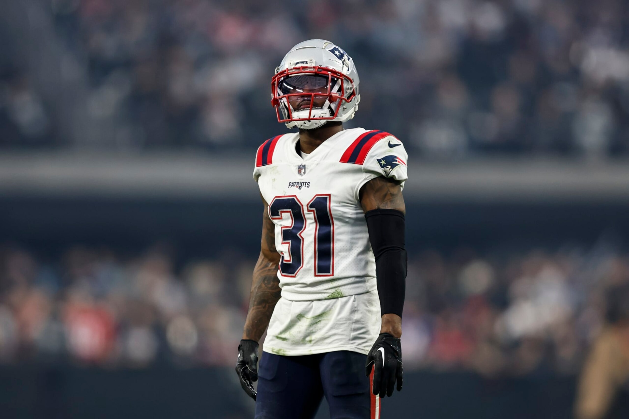 LAS VEGAS, NEVADA - DECEMBER 18: Jonathan Jones #31 of the New England Patriots looks on during an NFL football game between the Las Vegas Raiders and the New England Patriots at Allegiant Stadium on December 18, 2022 in Las Vegas, Nevada. (Photo by Michael Owens/Getty Images) LAS VEGAS, NEVADA - DECEMBER 18: Jonathan Jones #31 of the New England Patriots looks on during an NFL football game between the Las Vegas Raiders and the New England Patriots at Allegiant Stadium on December 18, 2022 in Las Vegas, Nevada. (Photo by Michael Owens/Getty Images)