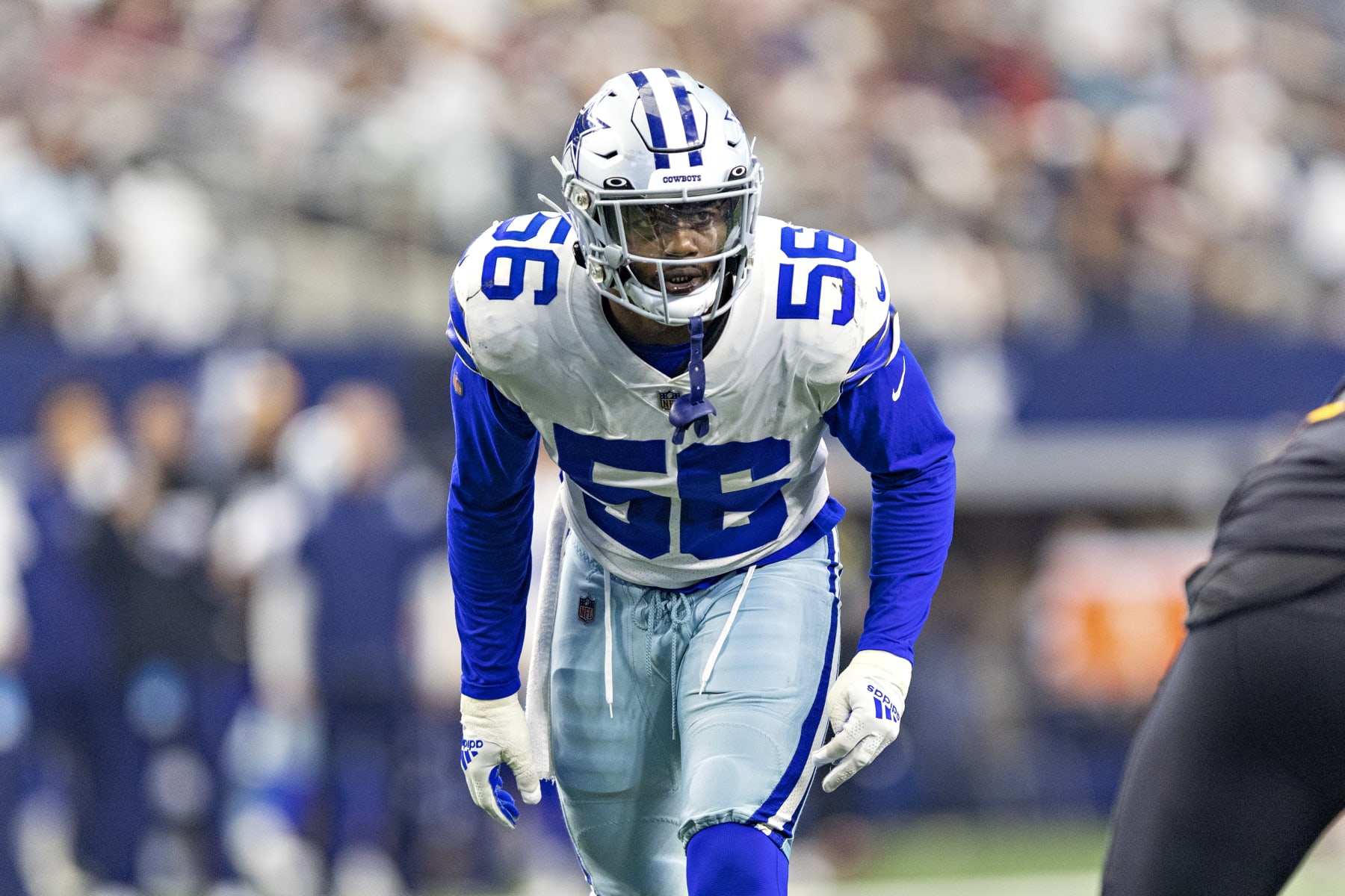 ARLINGTON, TEXAS - OCTOBER 2: Dante Fowler #56 of the Dallas Cowboys looks over the offense during a game against the Washington Commanders at AT&T Stadium on October 2, 2022 in Arlington, Texas. The Cowboys defeated the Commanders 25-10.  (Photo by Wesley Hitt/Getty Images)