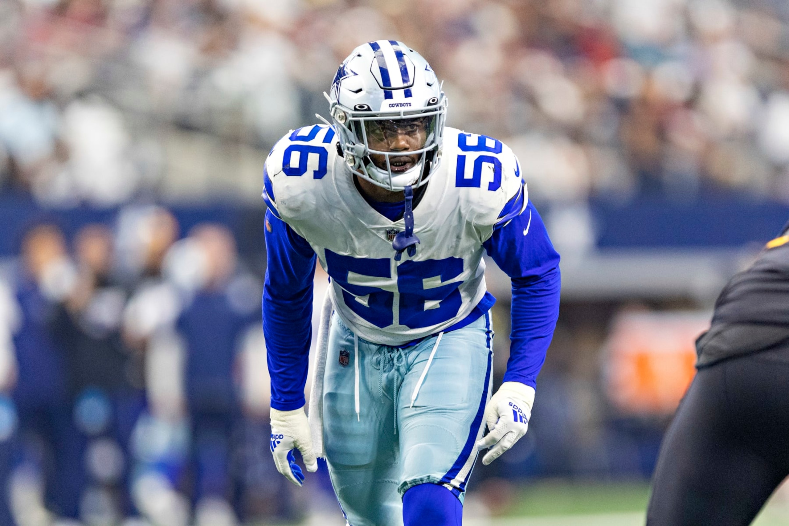 ARLINGTON, TEXAS - OCTOBER 2: Dante Fowler #56 of the Dallas Cowboys looks over the offense during a game against the Washington Commanders at AT&T Stadium on October 2, 2022 in Arlington, Texas. The Cowboys defeated the Commanders 25-10.  (Photo by Wesley Hitt/Getty Images)