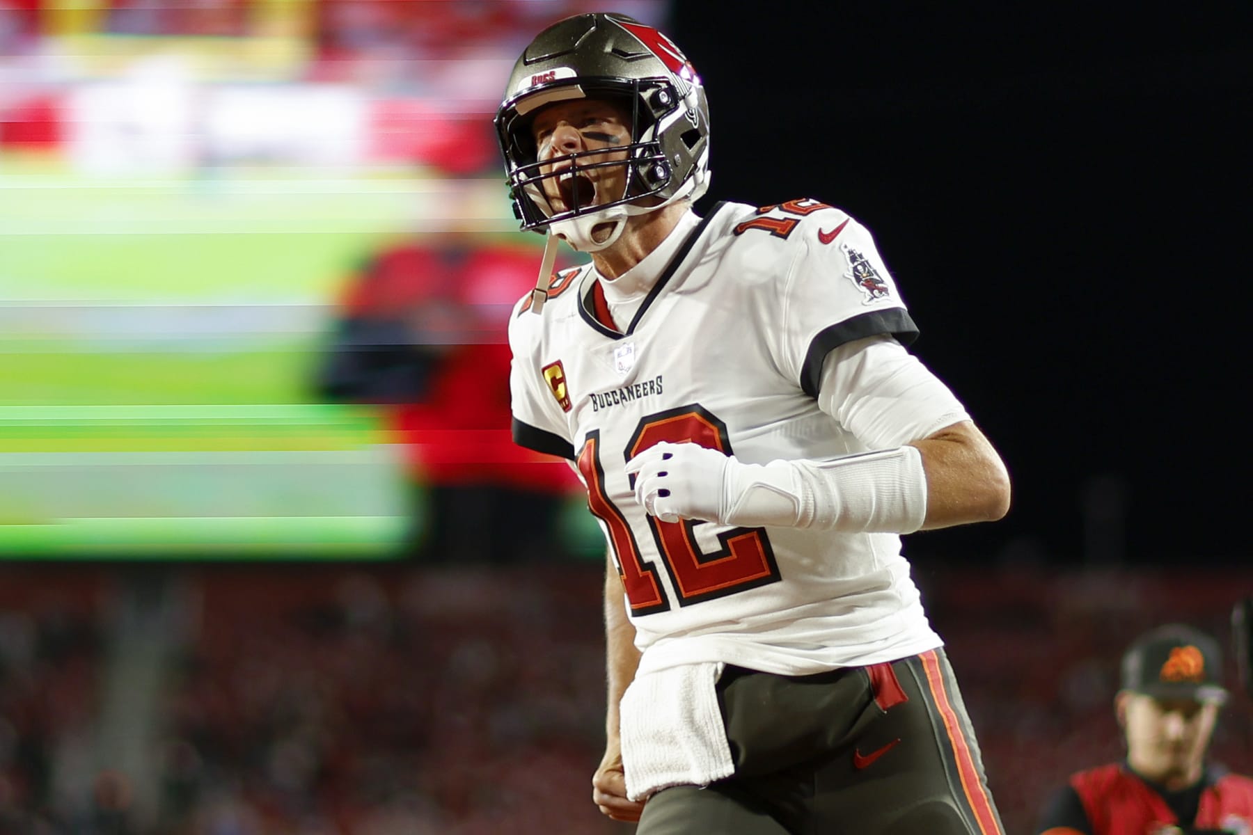 TAMPA, FLORIDA - JANUARY 16: Tom Brady #12 of the Tampa Bay Buccaneers warms up prior to a game against the Dallas Cowboys in the NFC Wild Card playoff game at Raymond James Stadium on January 16, 2023 in Tampa, Florida. (Photo by Mike Ehrmann/Getty Images)