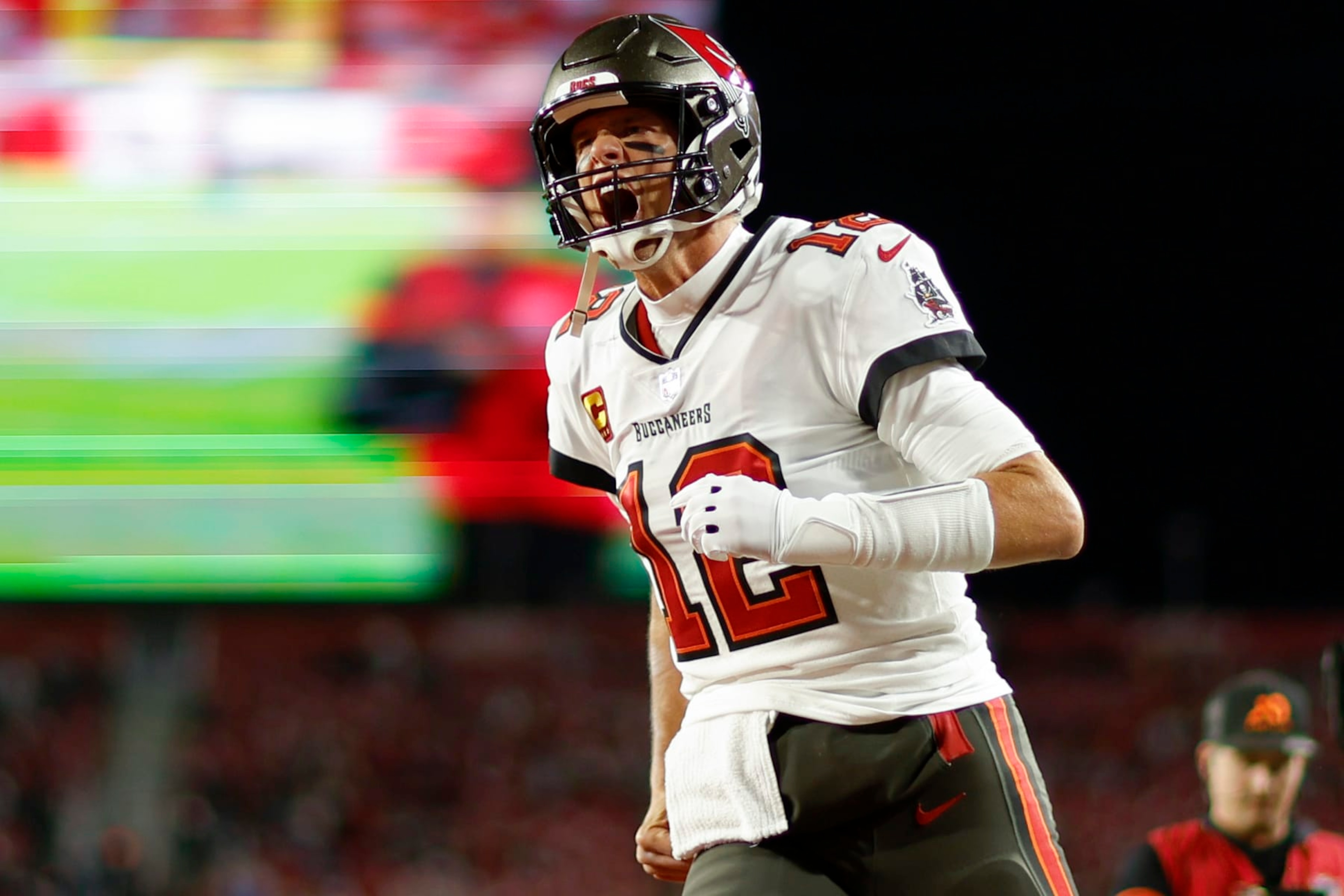 TAMPA, FLORIDA - JANUARY 16: Tom Brady #12 of the Tampa Bay Buccaneers warms up prior to a game against the Dallas Cowboys in the NFC Wild Card playoff game at Raymond James Stadium on January 16, 2023 in Tampa, Florida. (Photo by Mike Ehrmann/Getty Images)