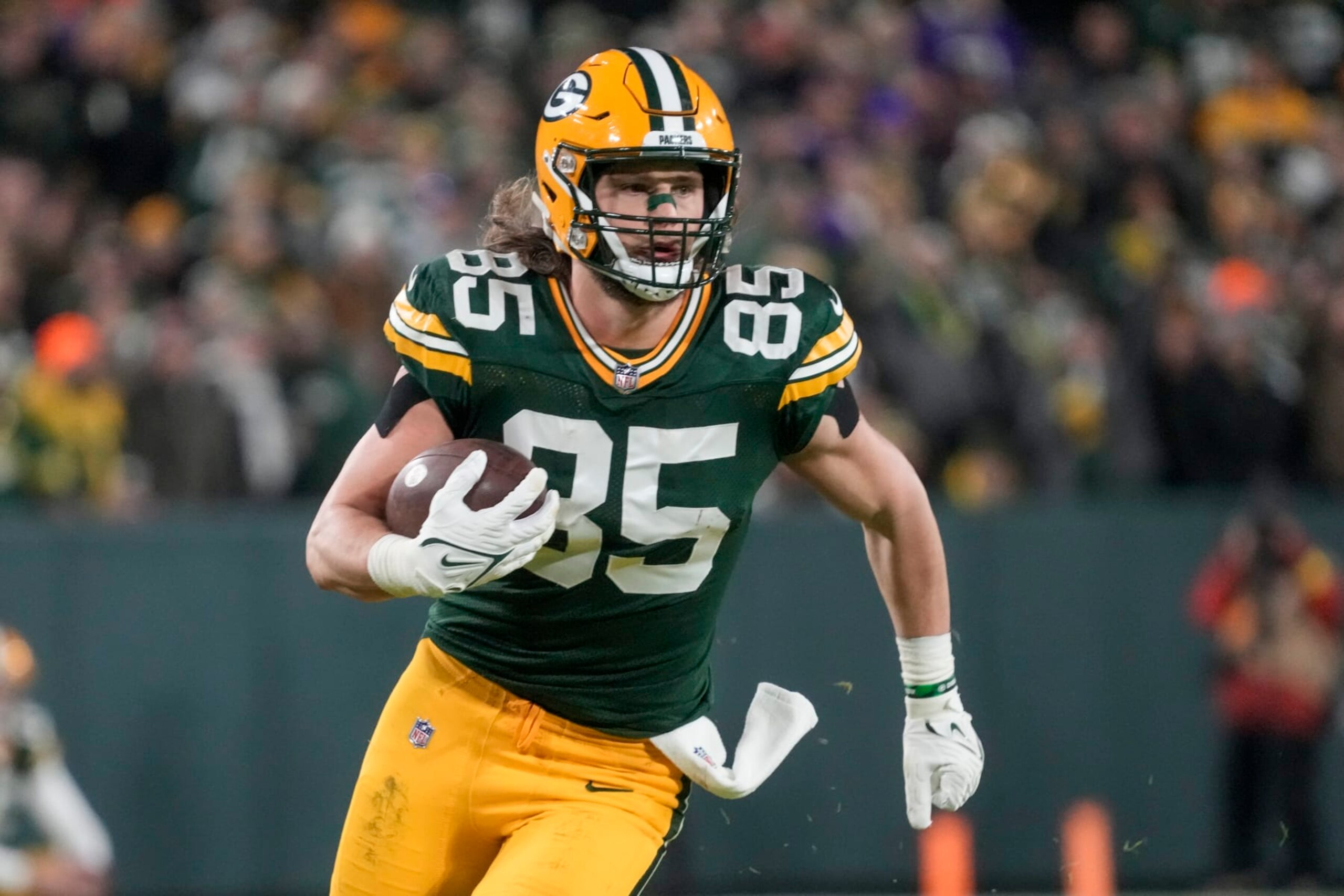 Green Bay Packers' Robert Tonyan runs during an NFL football game against the Minnesota Vikings Sunday, Jan. 1, 2023, in Green Bay, Wis. (AP Photo/Morry Gash)
