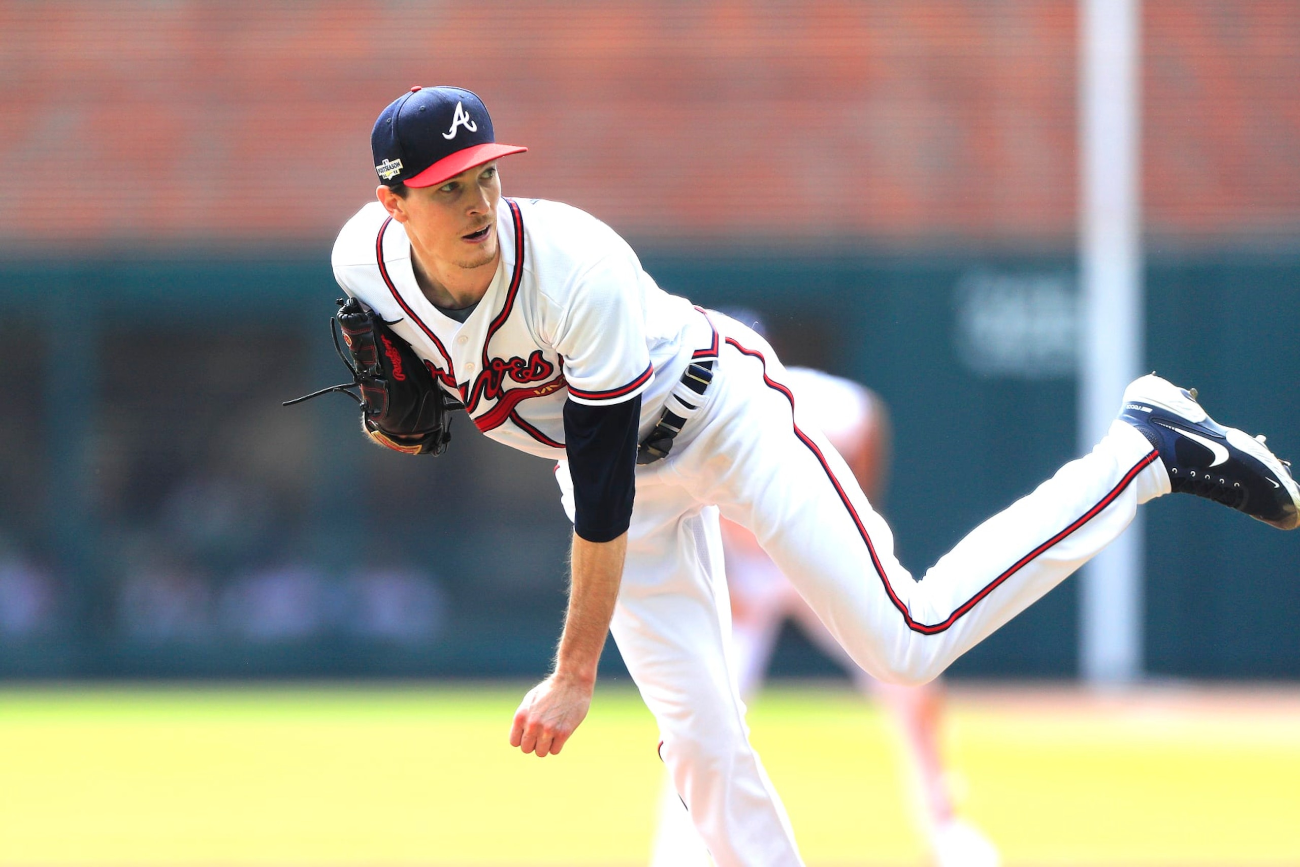 ATLANTA, GA - OCTOBER 11: Atlanta Braves starting pitcher Max Fried (54) delivers a pitch during Game 1 of the NLDS between the Atlanta Braves and the Philadephia Phillies on October 11, 2022 at Truist Park in Atlanta, Georgia.  (Photo by David J. Griffin/Icon Sportswire via Getty Images)