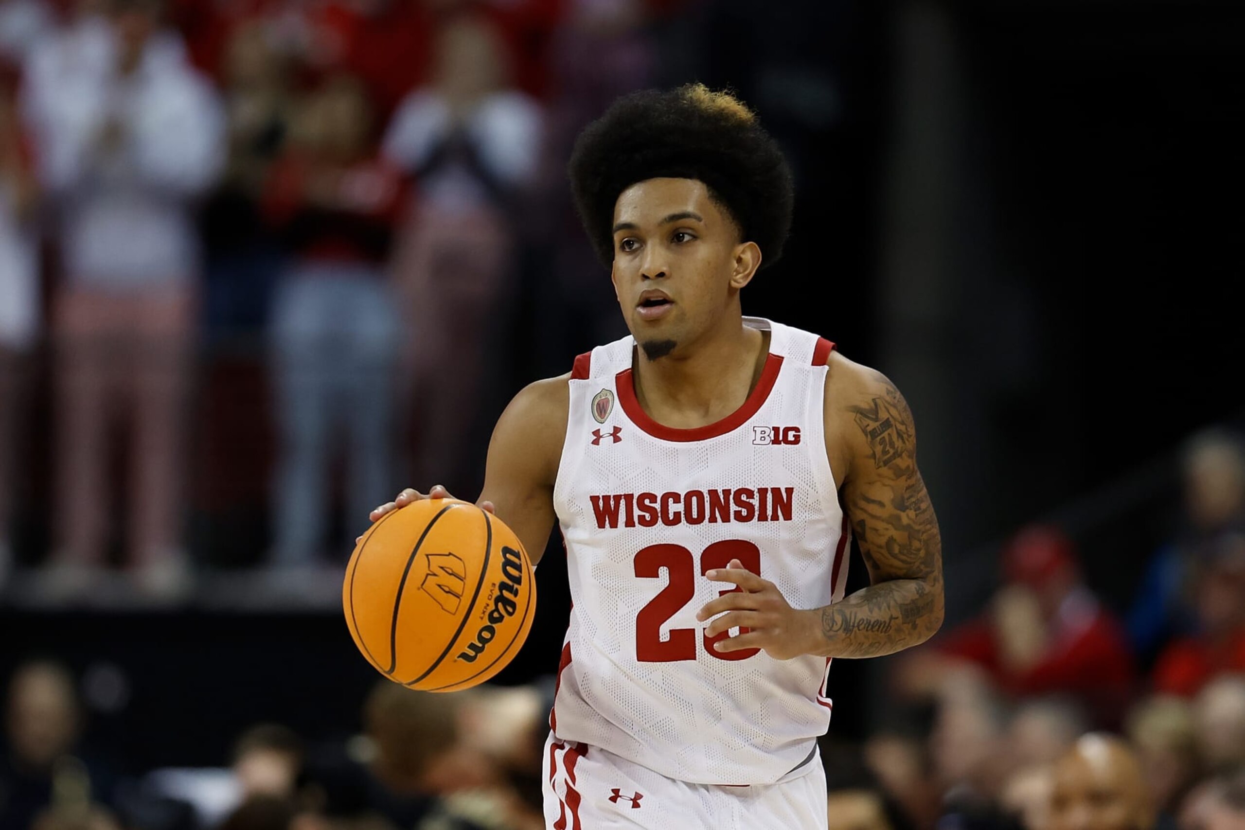 MADISON, WISCONSIN - MARCH 02: Chucky Hepburn #23 of the Wisconsin Badgers dribbles up court during the second half of the game against the Purdue Boilermakers at Kohl Center on March 02, 2023 in Madison, Wisconsin. (Photo by John Fisher/Getty Images)