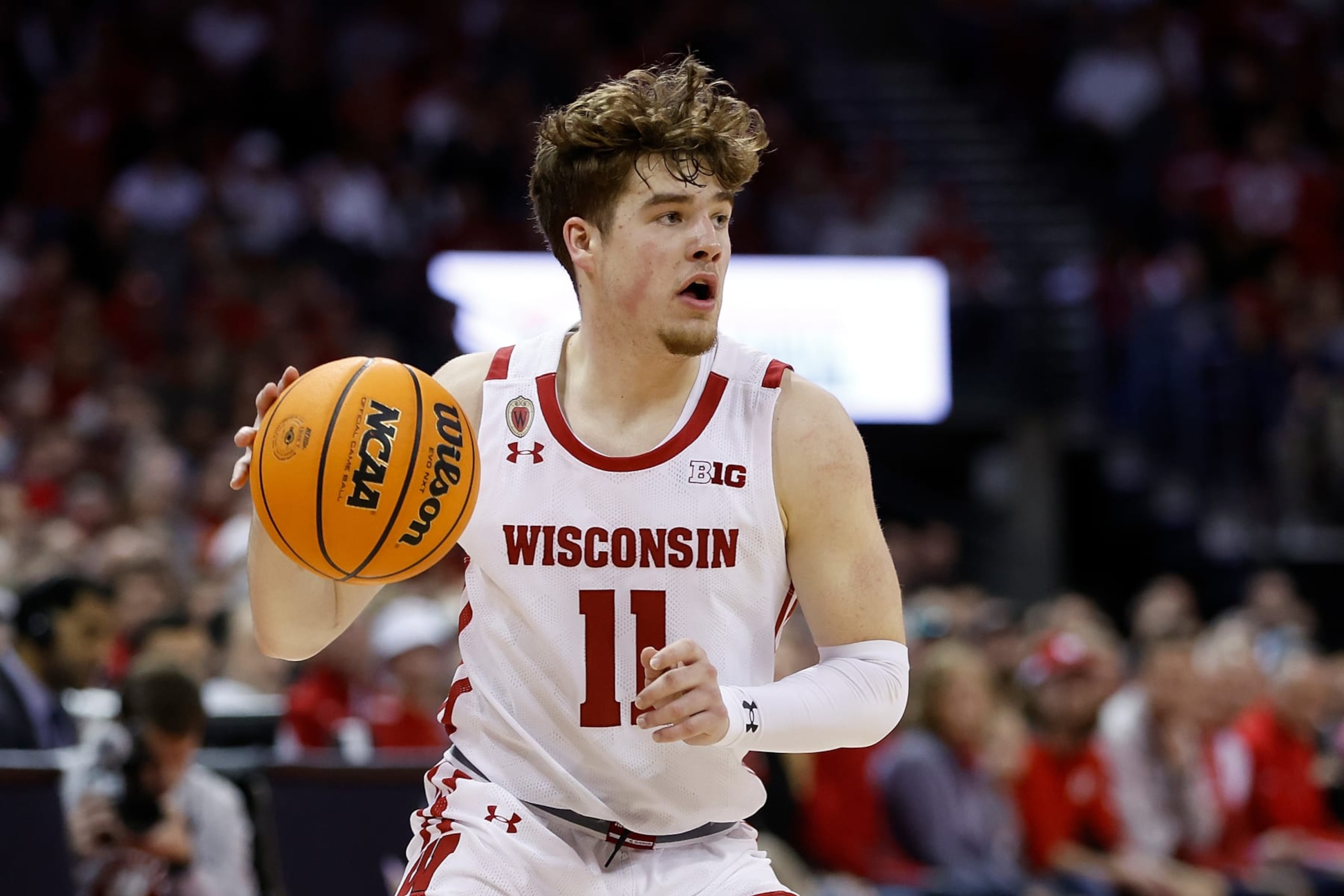 MADISON, WISCONSIN - MARCH 02: Max Klesmit #11 of the Wisconsin Badgers looks to drive toward the basket during the second half of the game against the Purdue Boilermakers at Kohl Center on March 02, 2023 in Madison, Wisconsin. (Photo by John Fisher/Getty Images)