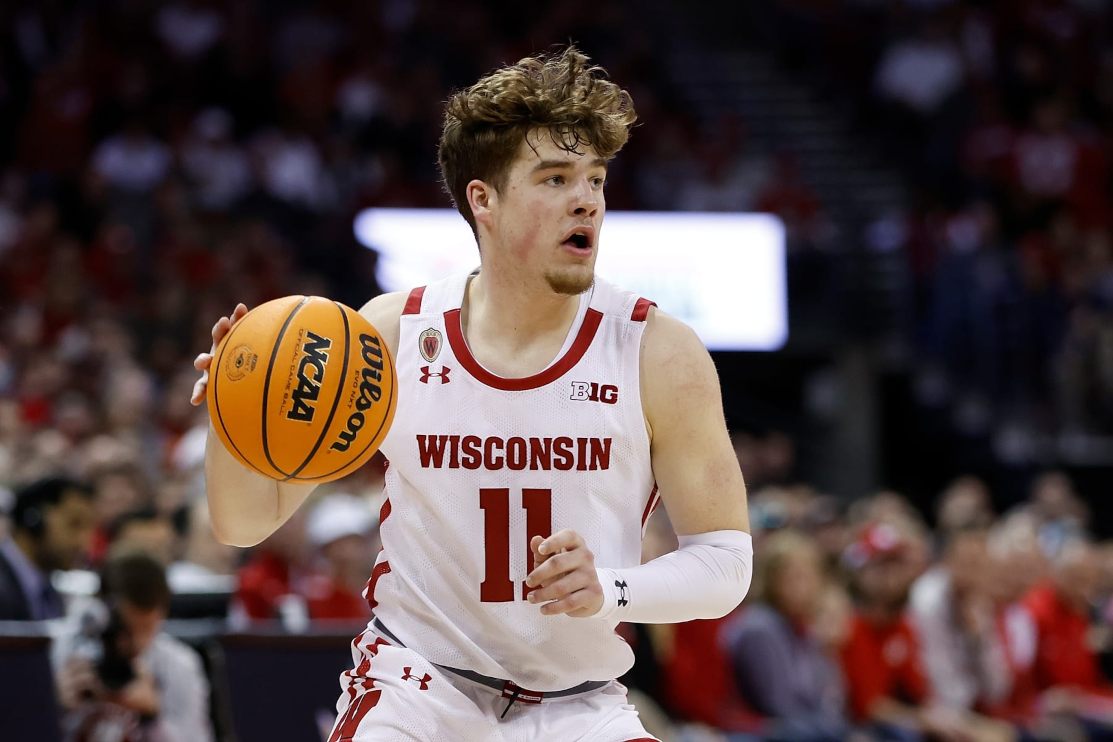 MADISON, WISCONSIN - MARCH 02: Max Klesmit #11 of the Wisconsin Badgers looks to drive toward the basket during the second half of the game against the Purdue Boilermakers at Kohl Center on March 02, 2023 in Madison, Wisconsin. (Photo by John Fisher/Getty Images)
