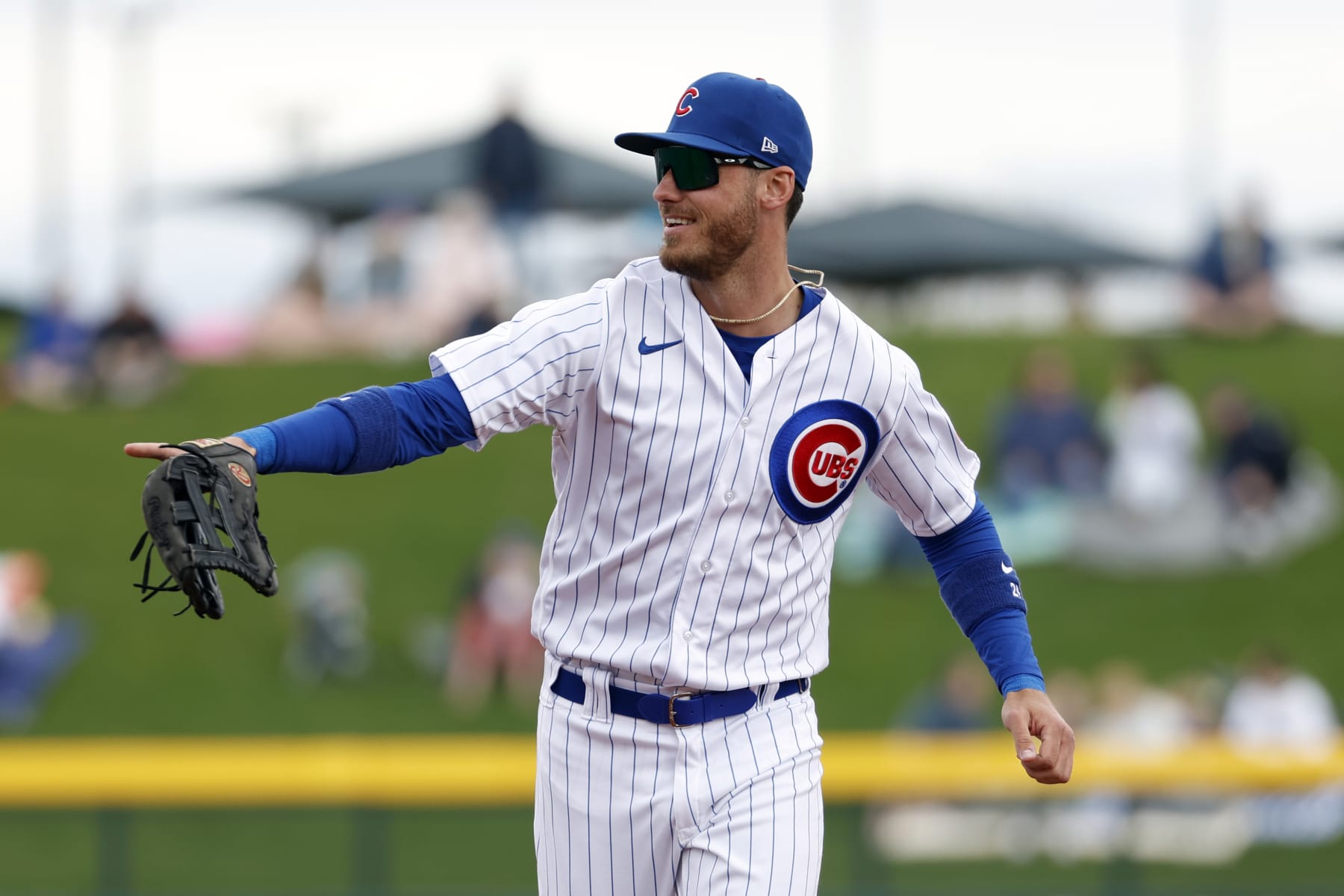 MESA, ARIZONA - MARCH 01: Cody Bellinger #24 of the Chicago Cubs smiles after the top of the first inning of a spring training game against the Seattle Mariners at Sloan Park on March 01, 2023 in Mesa, Arizona. (Photo by Chris Coduto/Getty Images)