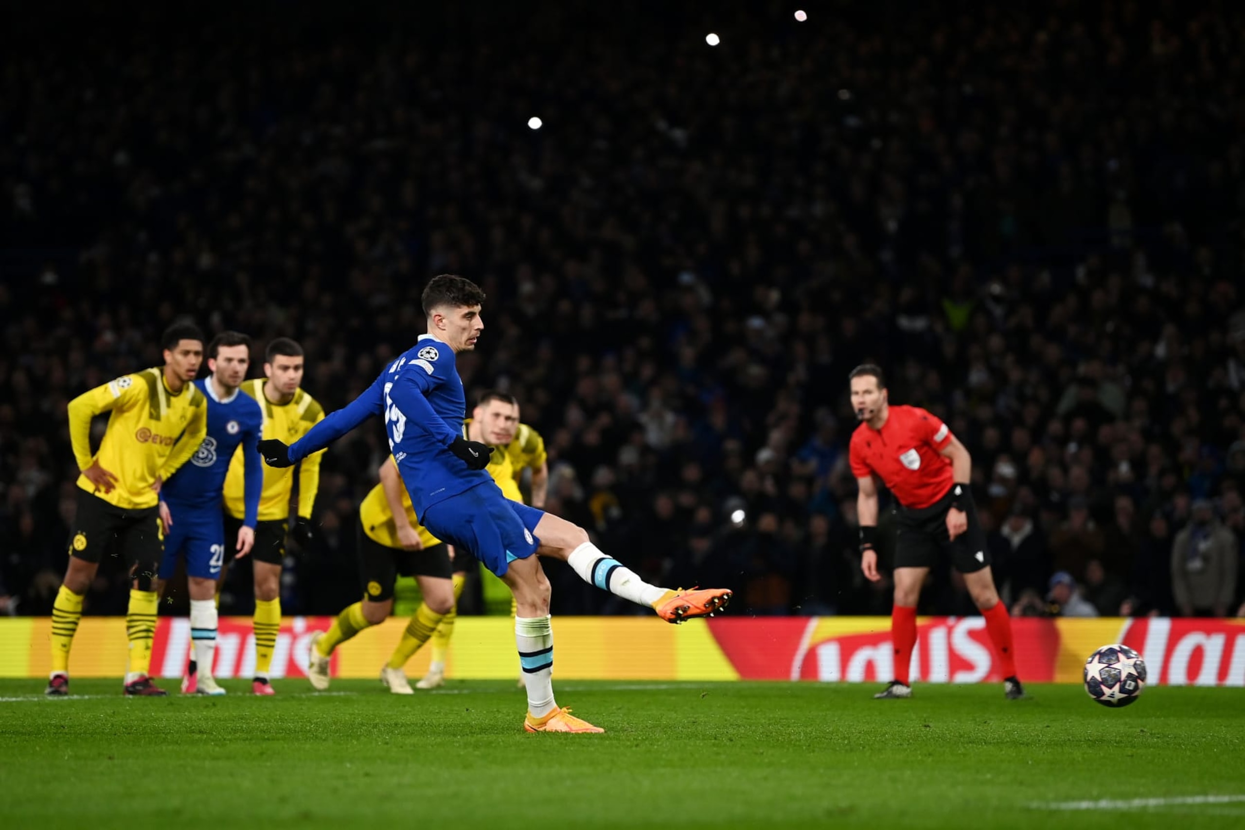 LONDON, ENGLAND - MARCH 07: Kai Havertz of Chelsea scores the team's second goal from their second penalty kick during the UEFA Champions League round of 16 leg two match between Chelsea FC and Borussia Dortmund at Stamford Bridge on March 07, 2023 in London, England. (Photo by Darren Walsh/Chelsea FC via Getty Images)
