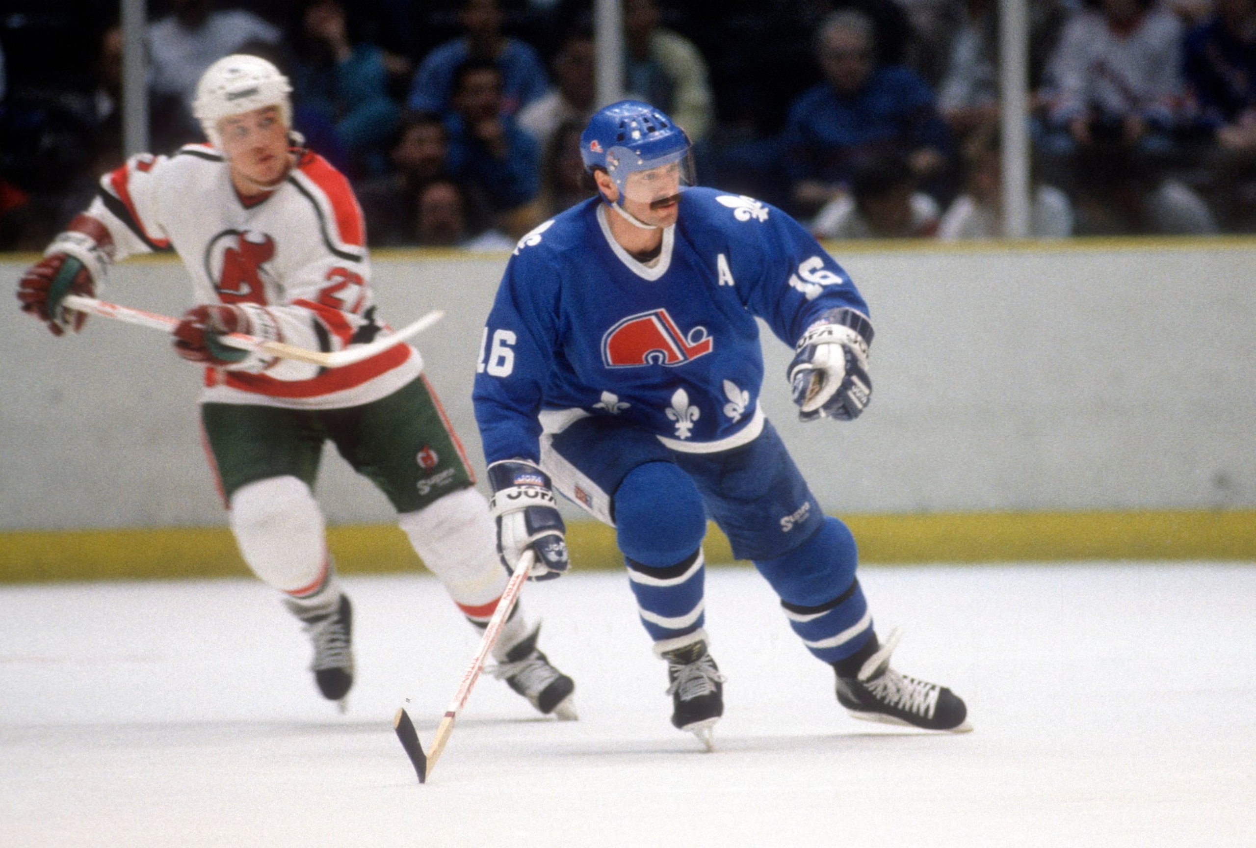 EAST RUTHERFORD, NJ - CIRCA 1989:  Michael Goulet #16 of the Quebec Nordiques skates against the New Jersey Devils during an NHL Hockey game circa 1989 at the Brendan Byrne Arena in East Rutherford, New Jersey. Goulet's playing career went from 1978-94. (Photo by Focus on Sport/Getty Images)