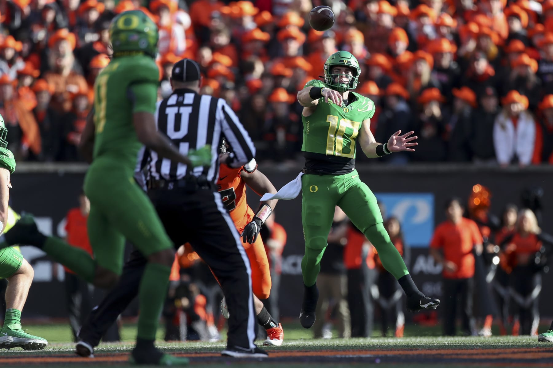 Oregon quarterback Bo Nix (10) throws a pass to wide receiver Troy Franklin (11) during the first half of an NCAA college football game on Saturday, Nov 26, 2022, in Corvallis, Ore. Oregon State won 38-34. (AP Photo/Amanda Loman)