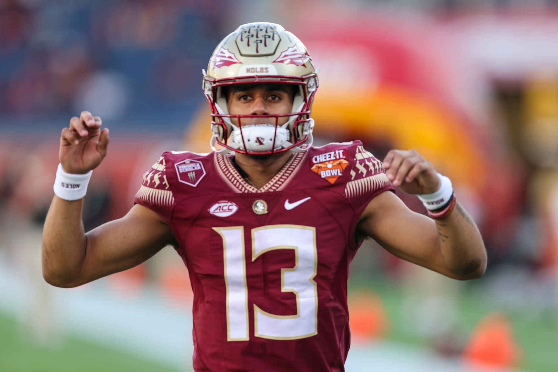 ORLANDO, FL - DECEMBER 29: Florida State Seminoles quarterback Jordan Travis (13) warms up before the Cheez-It Bowl between Oklahoma and Florida State on December 29, 2022 at Camping World Stadium, in Orlando FL. (Photo by Joe Petro/Icon Sportswire via Getty Images)